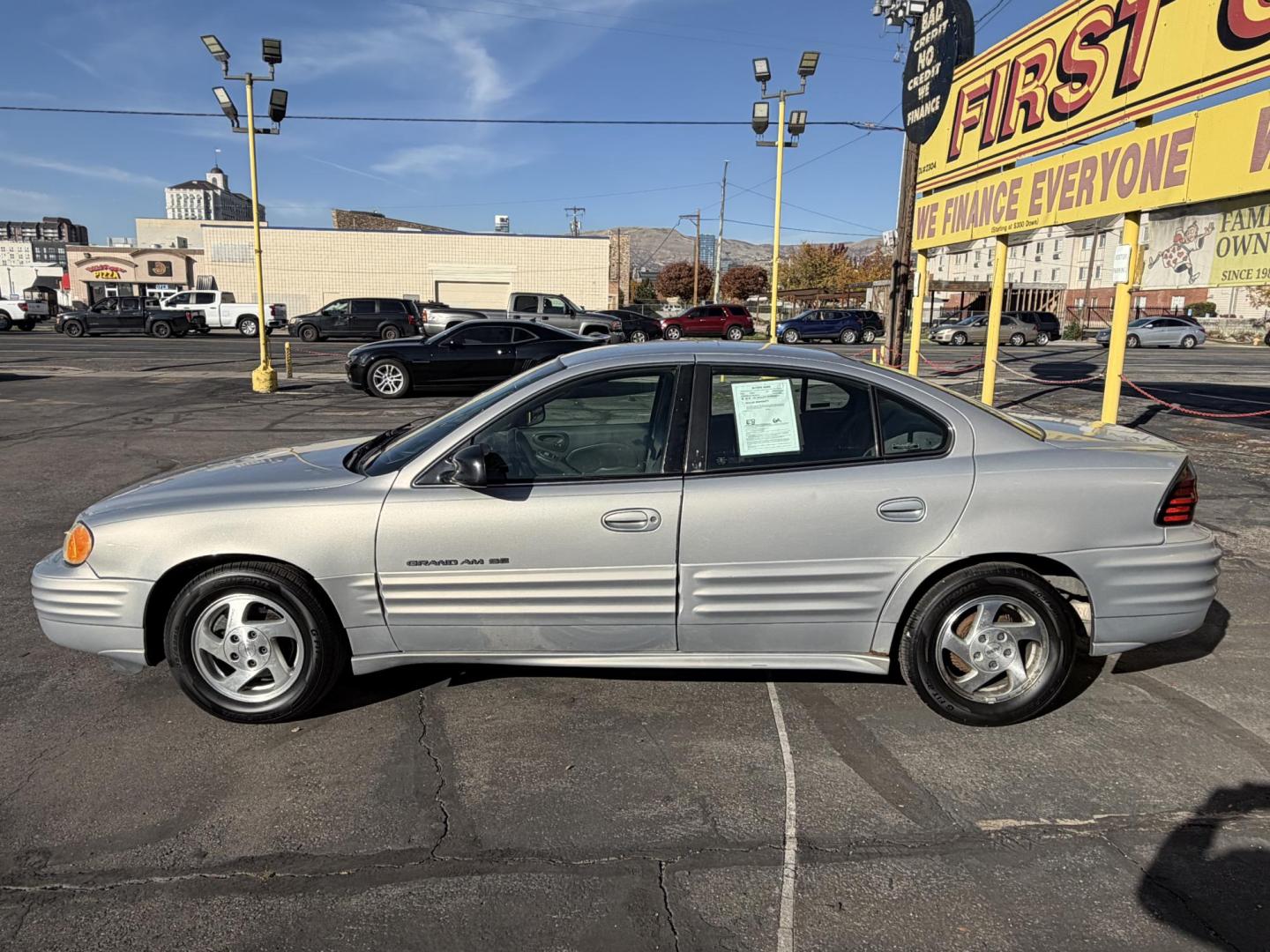2000 Silvermist Metallic /Gray Cloth Pontiac Grand AM SE1 (1G2NF52T0YC) with an 2.4L 4 Cyl. engine, Automatic transmission, located at 801 South State Street, Salt Lake City, UT, 84111, (801) 328-0098, 40.751953, -111.888206 - Clean title! Vehicle Features: SE1 Model, ABS Brakes, Air Conditioning, Alloy Wheels, AM/FM Stereo, Automatic Transmission, CD Audio, Cloth Seats, Cruise Control, Power Locks, Power Mirrors, Power Windows, Rear Defroster, Traction Control * All advertised prices are just dollars above cost to ma - Photo#8