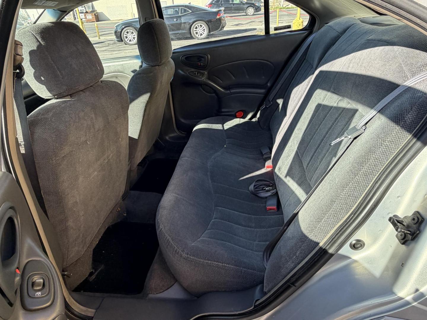 2000 Silvermist Metallic /Gray Cloth Pontiac Grand AM SE1 (1G2NF52T0YC) with an 2.4L 4 Cyl. engine, Automatic transmission, located at 801 South State Street, Salt Lake City, UT, 84111, (801) 328-0098, 40.751953, -111.888206 - Clean title! Vehicle Features: SE1 Model, ABS Brakes, Air Conditioning, Alloy Wheels, AM/FM Stereo, Automatic Transmission, CD Audio, Cloth Seats, Cruise Control, Power Locks, Power Mirrors, Power Windows, Rear Defroster, Traction Control * All advertised prices are just dollars above cost to ma - Photo#11