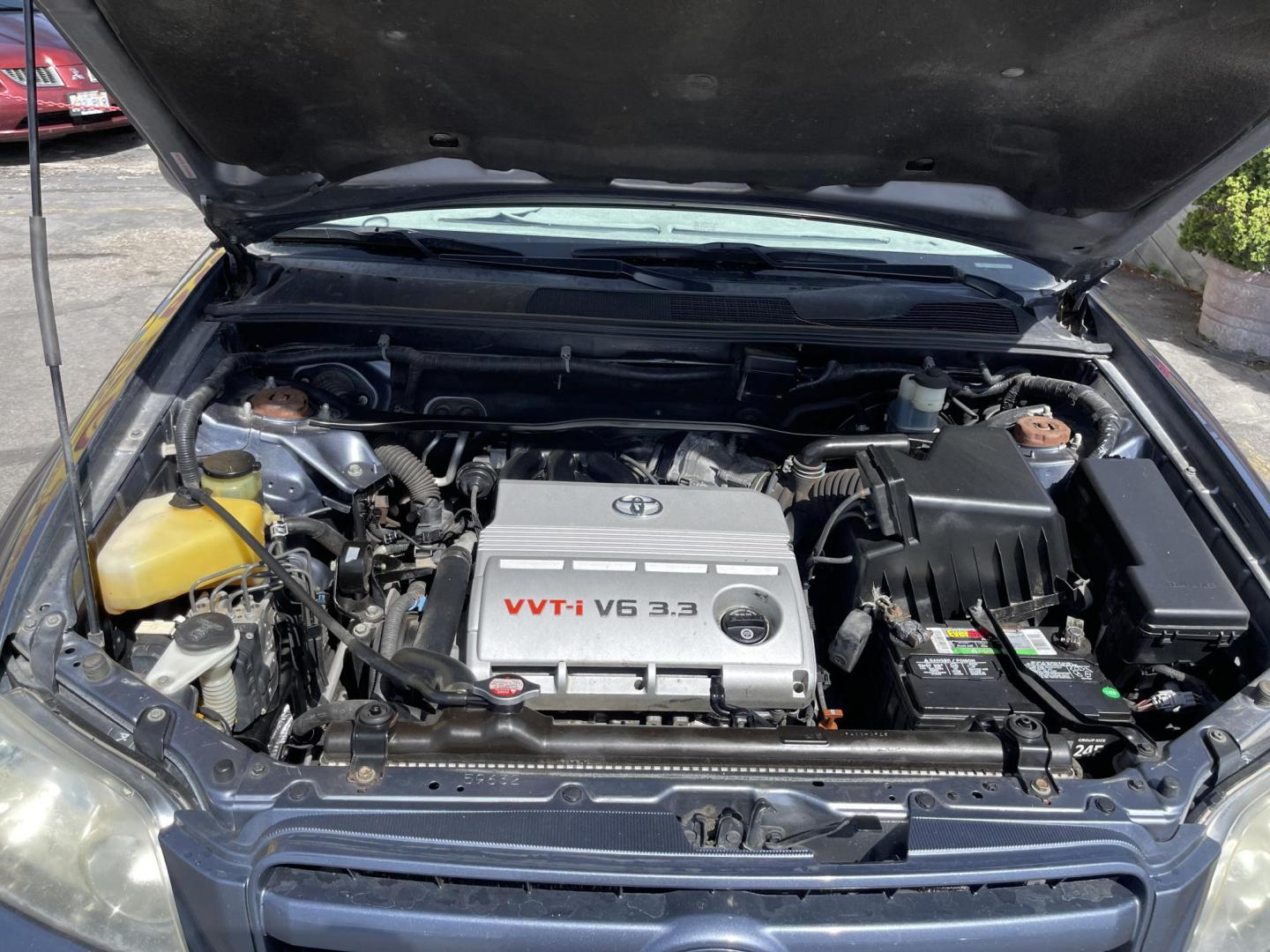 2007 Bluestone Metallic /Gray Cloth Toyota Highlander V6 4WD (JTEEP21A770) with an 3.3L V6 engine, Automatic transmission, located at 801 South State Street, Salt Lake City, UT, 84111, (801) 328-0098, 40.751953, -111.888206 - Our service department is OPEN DAILY to help with any of your service needs. Please call for immediate appointment! Clean Title!! Extra clean!! Immaculate condition!! Free Carfax!! Must see!! Warranty available!! Free Carfax!!! Vehicle Features: 4WD/AWD, ABS Brakes, Air Conditioning, Allo - Photo#14