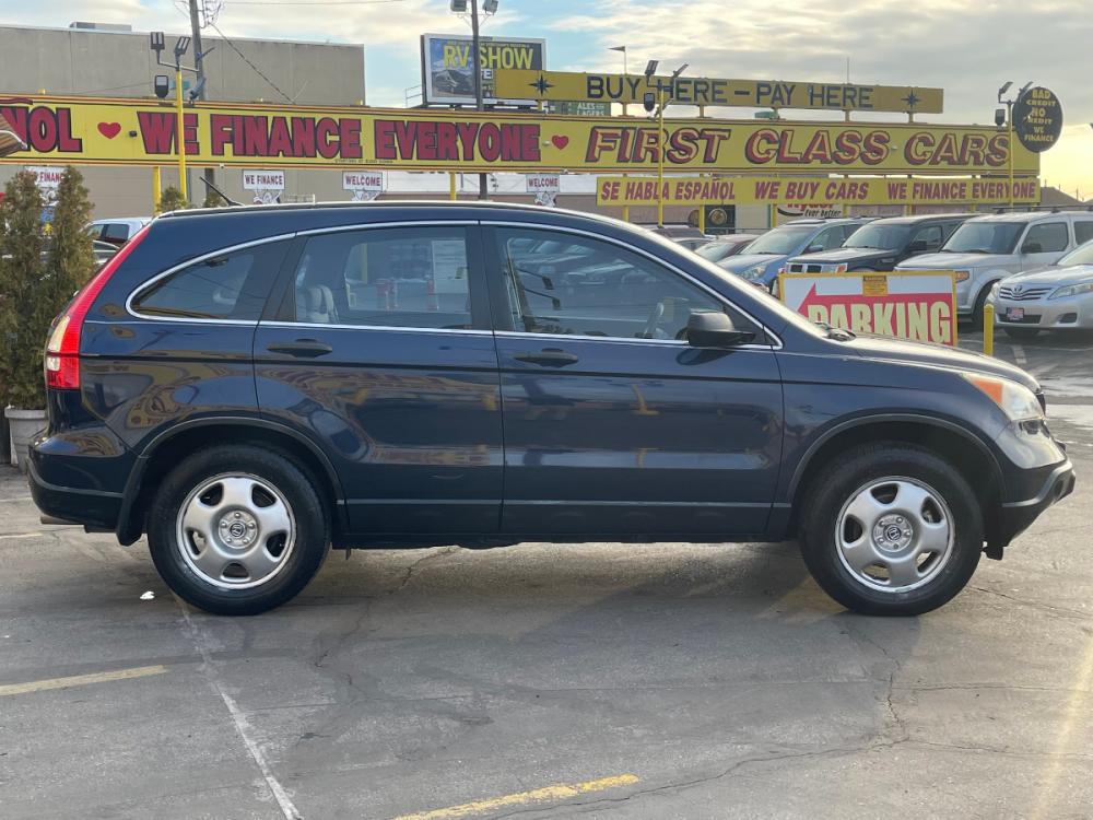 2009 Royal Blue Pearl Honda CR-V LX (JHLRE38329C) with an 2.4L 4 Cyl. engine, Automatic transmission, located at 801 South State Street, Salt Lake City, UT, 84111, (801) 328-0098, 40.751953, -111.888206 - Photo #5