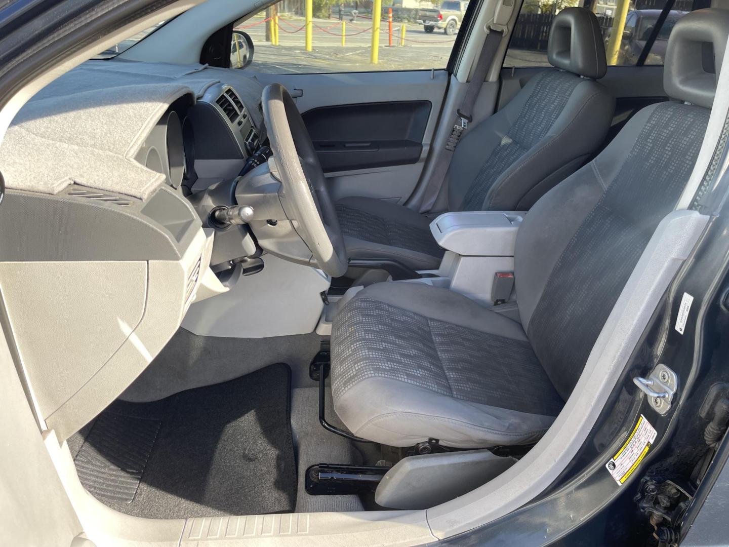 2007 Steel Blue Metallic /Gray Cloth Dodge Caliber SE (1B3HB28B37D) with an 2.0L 4 Cyl. engine, Automatic transmission, located at 801 South State Street, Salt Lake City, UT, 84111, (801) 328-0098, 40.751953, -111.888206 - Vehicle Features: AM/FM/CD, AUX INPUT, AUTOMATIC, BLUETOOTH RADIO, POWER WINDOWS, POWER LOCKS, HATCHBACK, 2.0 LITER 4 CYLINDER, CLEAN TITLE, POWER BRAKES, POWER STEERING, 4 DOOR, CLOTH INTERIOR, DEFROST Our service department is OPEN DAILY to help with any of your service needs. Please call for - Photo#11