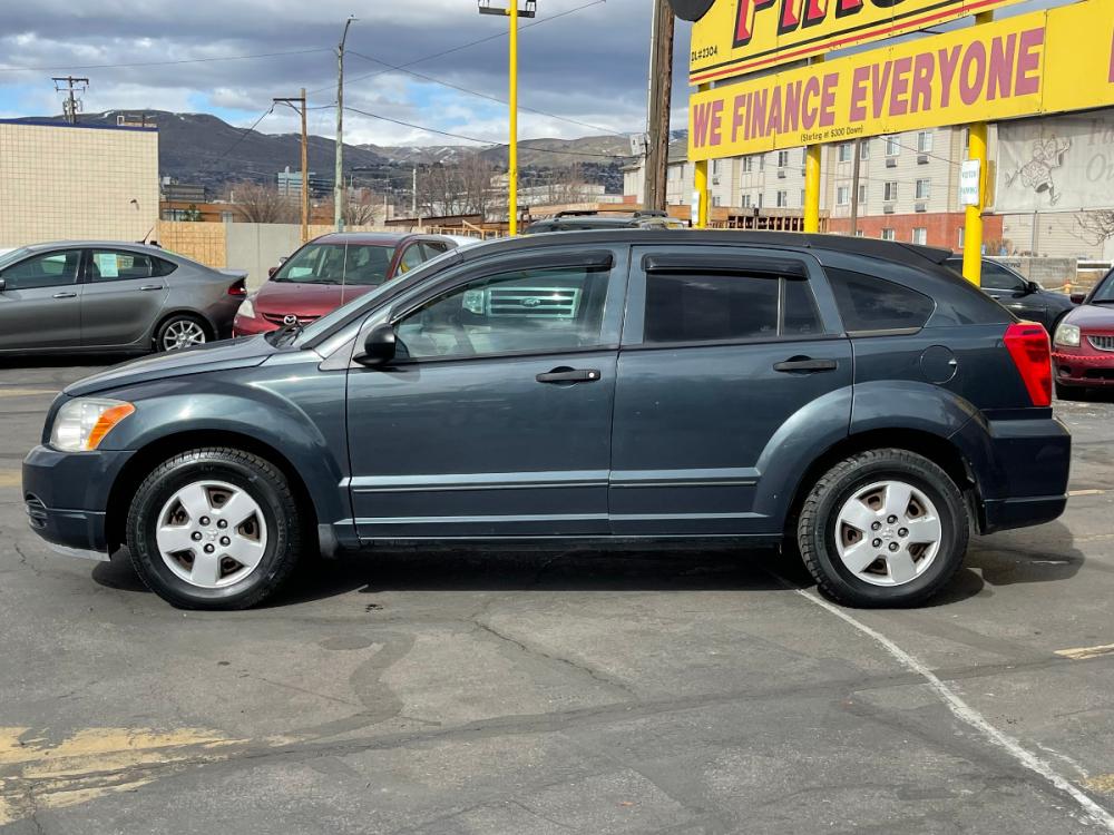 2007 Steel Blue Metallic /Gray Cloth Dodge Caliber SE (1B3HB28B37D) with an 2.0L 4 Cyl. engine, Automatic transmission, located at 801 South State Street, Salt Lake City, UT, 84111, (801) 328-0098, 40.751953, -111.888206 - Photo #1
