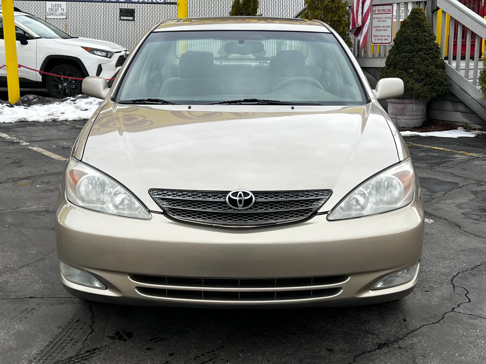 2003 Desert Sand Mica /Tan Cloth Toyota Camry XLE (4T1BE30K03U) with an 2.4L 4 Cyl. engine, located at 801 South State Street, Salt Lake City, UT, 84111, (801) 328-0098, 40.751953, -111.888206 - Features: XLE Model, 2.4L I-4, Automatic Transmission, Front Wheel Drive, ABS Brakes, Air Conditioning, Alloy Wheels, JBL,Sound System, AM-FM Stereo, Cassette Player, CD Player, Cruise Control, Power Windows, Power Locks, Power Mirrors, Power Sunroof, Power Seat(s), Rear Defroster - Photo #3