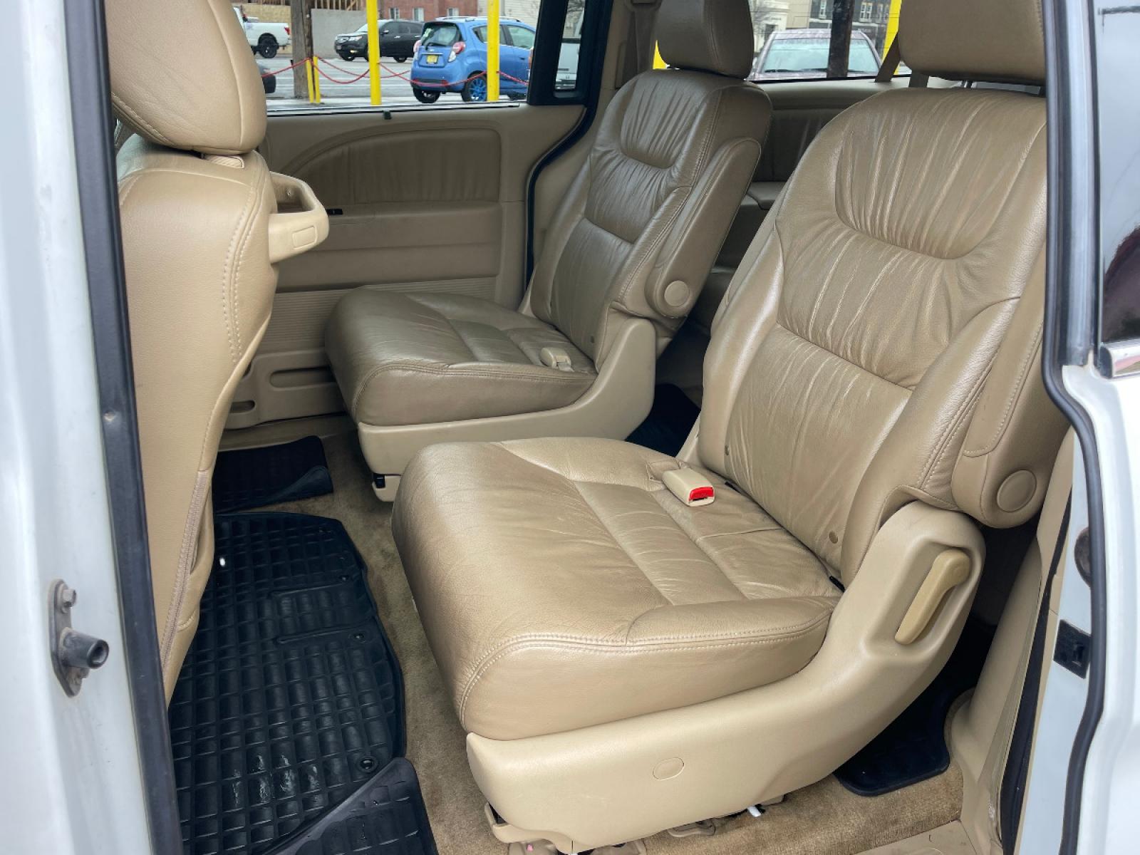 2010 Taffeta White /Tan Leather Honda Odyssey EX-L (5FNRL3H6XAB) with an 3.5L V6 engine, Automatic transmission, located at 801 South State Street, Salt Lake City, UT, 84111, (801) 328-0098, 40.751953, -111.888206 - Life is crazy. Now is the time to buy! All of our prices are just dollars above our cost. These prices will change as soon as life isn't so crazy. So please call or come in. We are here to save you a lot of money! Our service department is OPEN DAILY to help with any of your service need - Photo #23