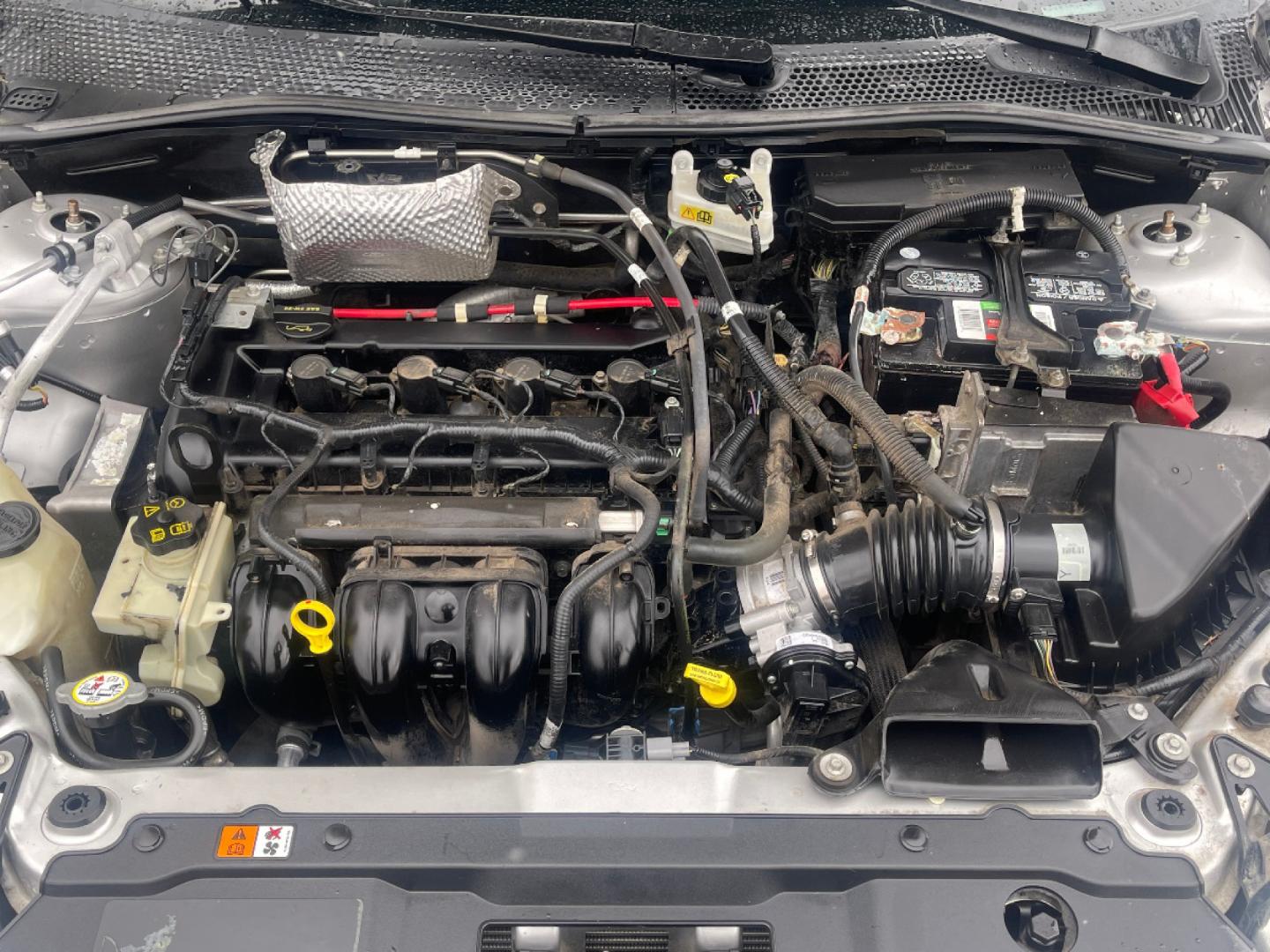 2010 Ingot Silver Metallic /Black Cloth Ford Focus SE (1FAHP3FN6AW) with an 2.0L 4 Cyl. engine, Automatic transmission, located at 801 South State Street, Salt Lake City, UT, 84111, (801) 328-0098, 40.751953, -111.888206 - Life is crazy. Now is the time to buy! All of our prices are just dollars above our cost. These prices will change as soon as life isn't so crazy. So please call or come in. We are here to save you a lot of money! Our service department is OPEN DAILY to help with any of your service needs. P - Photo#10