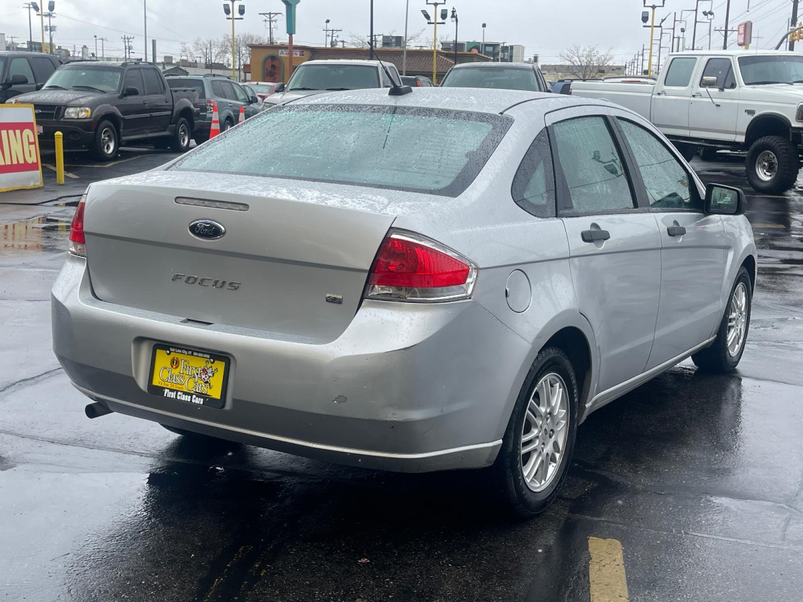 2010 Ingot Silver Metallic /Black Cloth Ford Focus SE (1FAHP3FN6AW) with an 2.0L 4 Cyl. engine, Automatic transmission, located at 801 South State Street, Salt Lake City, UT, 84111, (801) 328-0098, 40.751953, -111.888206 - Life is crazy. Now is the time to buy! All of our prices are just dollars above our cost. These prices will change as soon as life isn't so crazy. So please call or come in. We are here to save you a lot of money! Our service department is OPEN DAILY to help with any of your service need - Photo #6