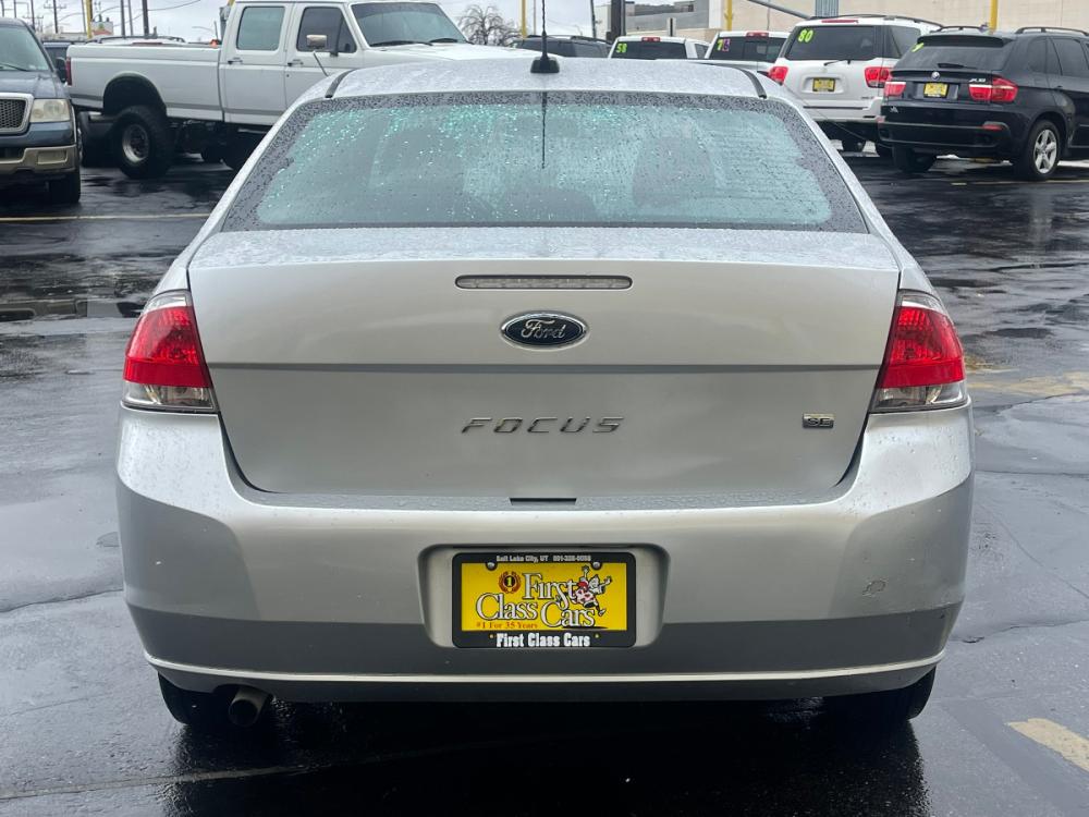 2010 Ingot Silver Metallic /Black Cloth Ford Focus SE (1FAHP3FN6AW) with an 2.0L 4 Cyl. engine, Automatic transmission, located at 801 South State Street, Salt Lake City, UT, 84111, (801) 328-0098, 40.751953, -111.888206 - Photo #7