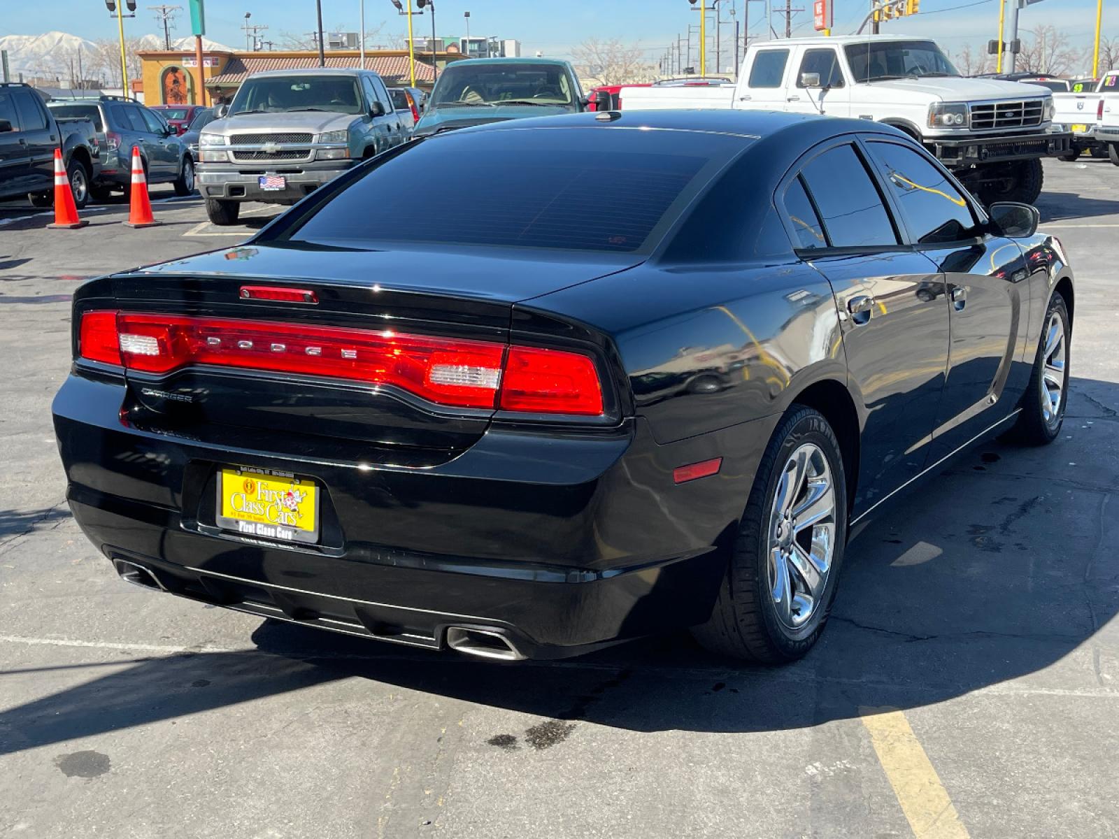 2013 Black /Black Leather Dodge Charger SXT Plus (2C3CDXHG1DH) with an 3.6L V6 engine, Automatic transmission, located at 801 South State Street, Salt Lake City, UT, 84111, (801) 328-0098, 40.751953, -111.888206 - Life is crazy. Now is the time to buy! All of our prices are just dollars above our cost. These prices will change as soon as life isn't so crazy. So please call or come in. We are here to save you a lot of money! Our service department is OPEN DAILY to help with any of your service need - Photo #6