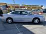 2005 Blue Ice Metallic /Gray Leather Buick LaCrosse CXL (2G4WD562151) with an 3.8L V6 engine, Automatic transmission, located at 801 South State Street, Salt Lake City, UT, 84111, (801) 328-0098, 40.751953, -111.888206 - Clean Title! Must see immaculate condition inside and out! An older retired grandpa was the previous owner and took excellent care for it! Approved for up to a 5 year extended warranty that can be added on at time of sale!!! Vehicle Features: CXL Model, Air Conditioning, Alloy Wheels, AM/FM S - Photo#6