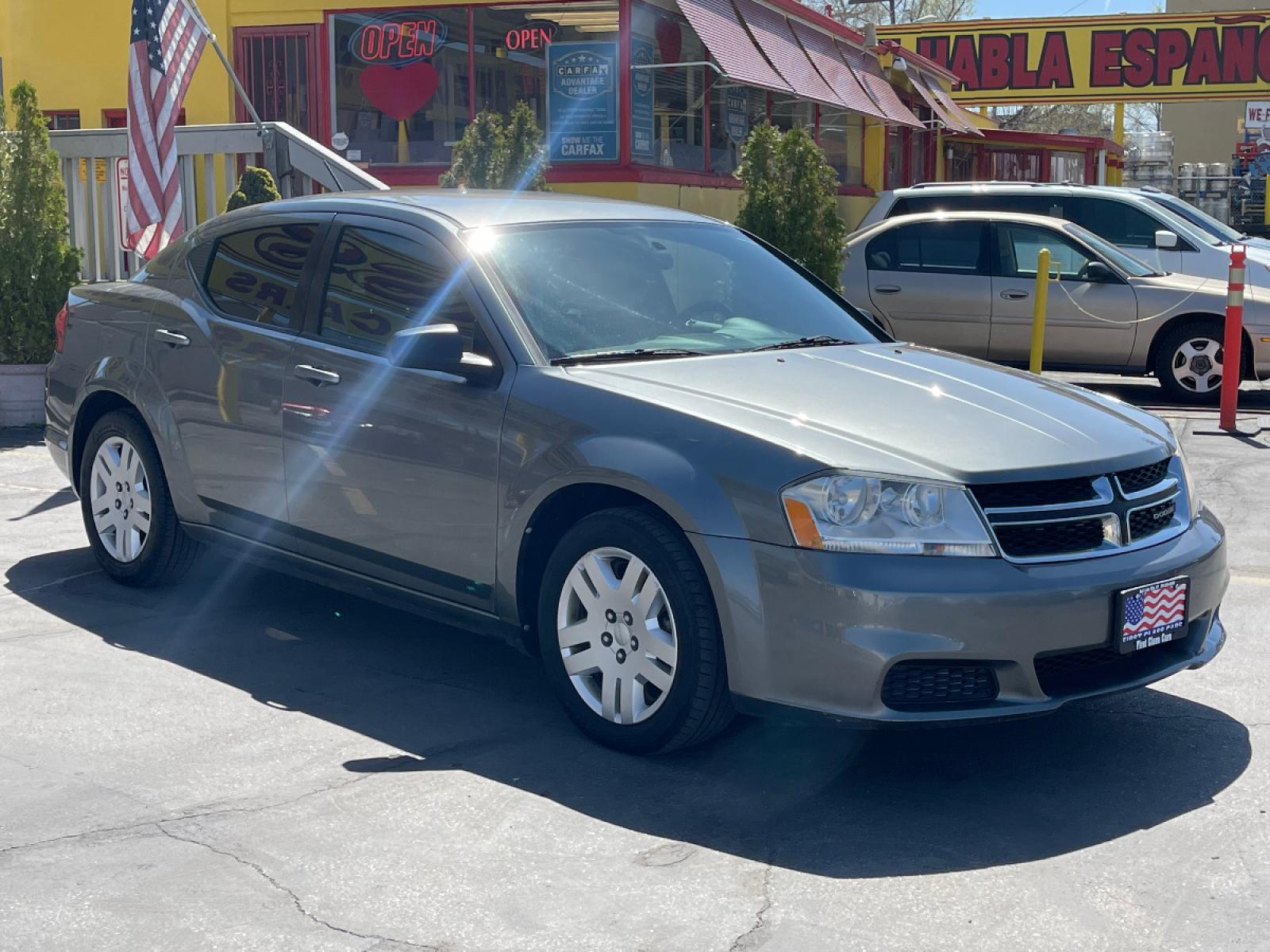 2013 Mineral Gray Metallic /Gray Cloth Dodge Avenger SE (1C3CDZAB5DN) with an 2.4L 4 Cyl. engine, Automatic transmission, located at 801 South State Street, Salt Lake City, UT, 84111, (801) 328-0098, 40.751953, -111.888206 - Life is crazy. Now is the time to buy! All of our prices are just dollars above our cost. These prices will change as soon as life isn't so crazy. So please call or come in. We are here to save you a lot of money! Our service department is OPEN DAILY to help with any of your service need - Photo #4