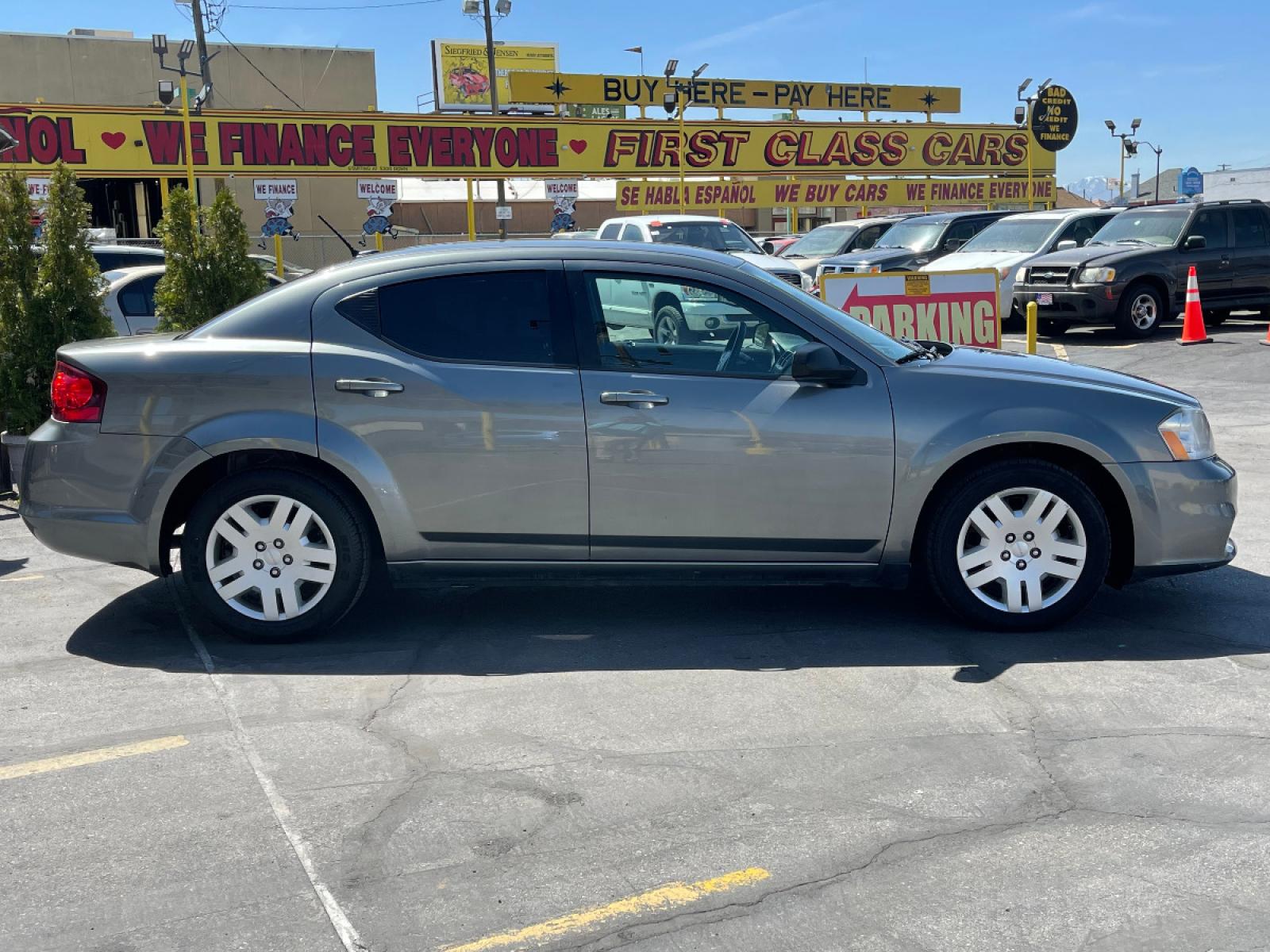 2013 Mineral Gray Metallic /Gray Cloth Dodge Avenger SE (1C3CDZAB5DN) with an 2.4L 4 Cyl. engine, Automatic transmission, located at 801 South State Street, Salt Lake City, UT, 84111, (801) 328-0098, 40.751953, -111.888206 - Life is crazy. Now is the time to buy! All of our prices are just dollars above our cost. These prices will change as soon as life isn't so crazy. So please call or come in. We are here to save you a lot of money! Our service department is OPEN DAILY to help with any of your service need - Photo #5