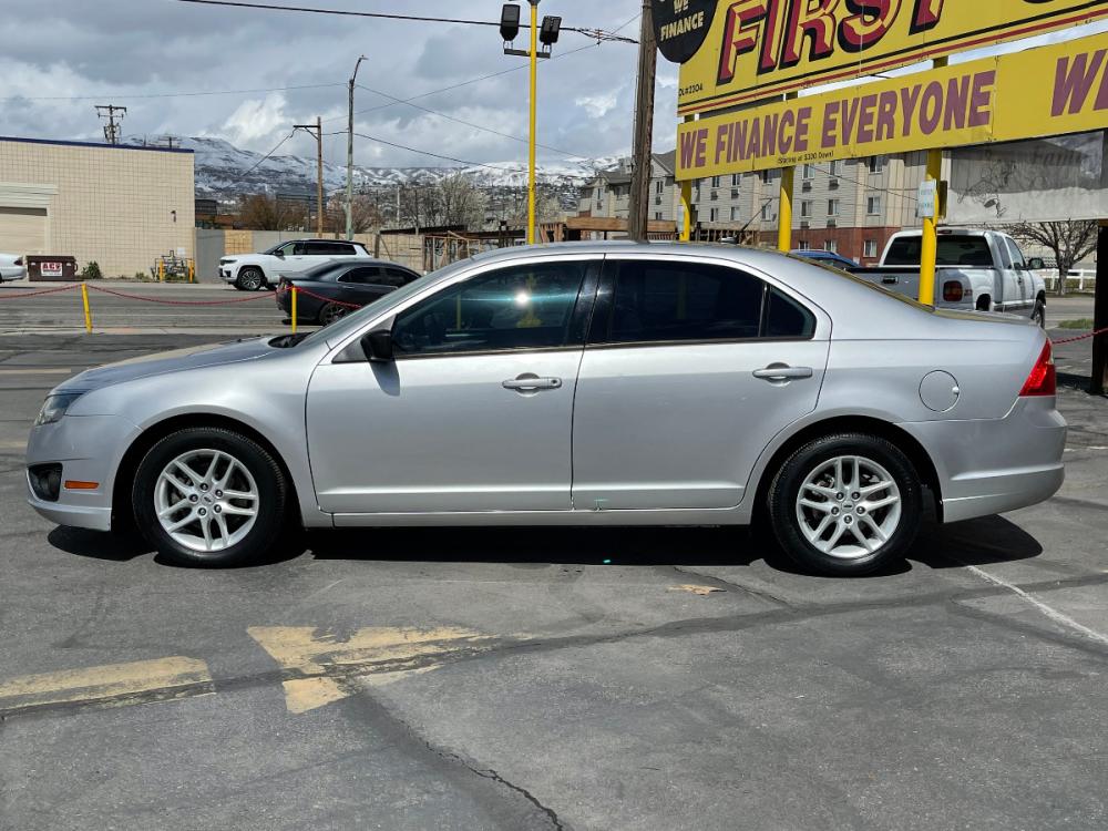 2012 Moondust Silver Metallic /Gray Cloth Ford Fusion S (3FAHP0GA1CR) with an 2.5L 4 Cyl. engine, Automatic transmission, located at 801 South State Street, Salt Lake City, UT, 84111, (801) 328-0098, 40.751953, -111.888206 - Photo #1