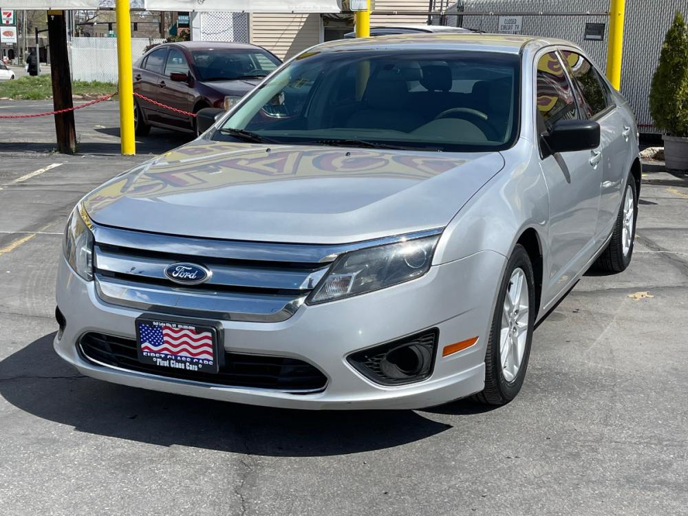 2012 Moondust Silver Metallic /Gray Cloth Ford Fusion S (3FAHP0GA1CR) with an 2.5L 4 Cyl. engine, Automatic transmission, located at 801 South State Street, Salt Lake City, UT, 84111, (801) 328-0098, 40.751953, -111.888206 - Photo #2