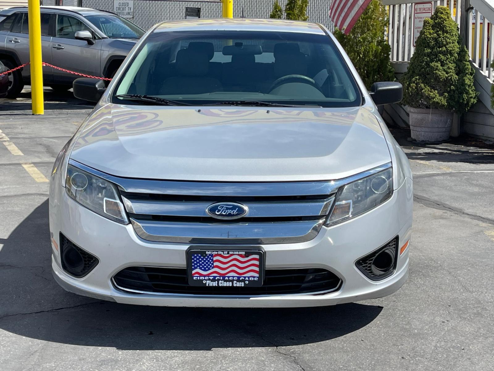 2012 Moondust Silver Metallic /Gray Cloth Ford Fusion S (3FAHP0GA1CR) with an 2.5L 4 Cyl. engine, Automatic transmission, located at 801 South State Street, Salt Lake City, UT, 84111, (801) 328-0098, 40.751953, -111.888206 - Life is crazy. Now is the time to buy! All of our prices are just dollars above our cost. These prices will change as soon as life isn't so crazy. So please call or come in. We are here to save you a lot of money! Our service department is OPEN DAILY to help with any of your service need - Photo #3