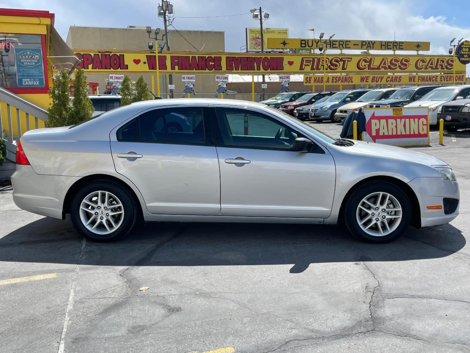 2012 Moondust Silver Metallic /Gray Cloth Ford Fusion S (3FAHP0GA1CR) with an 2.5L 4 Cyl. engine, Automatic transmission, located at 801 South State Street, Salt Lake City, UT, 84111, (801) 328-0098, 40.751953, -111.888206 - Life is crazy. Now is the time to buy! All of our prices are just dollars above our cost. These prices will change as soon as life isn't so crazy. So please call or come in. We are here to save you a lot of money! Our service department is OPEN DAILY to help with any of your service need - Photo #5