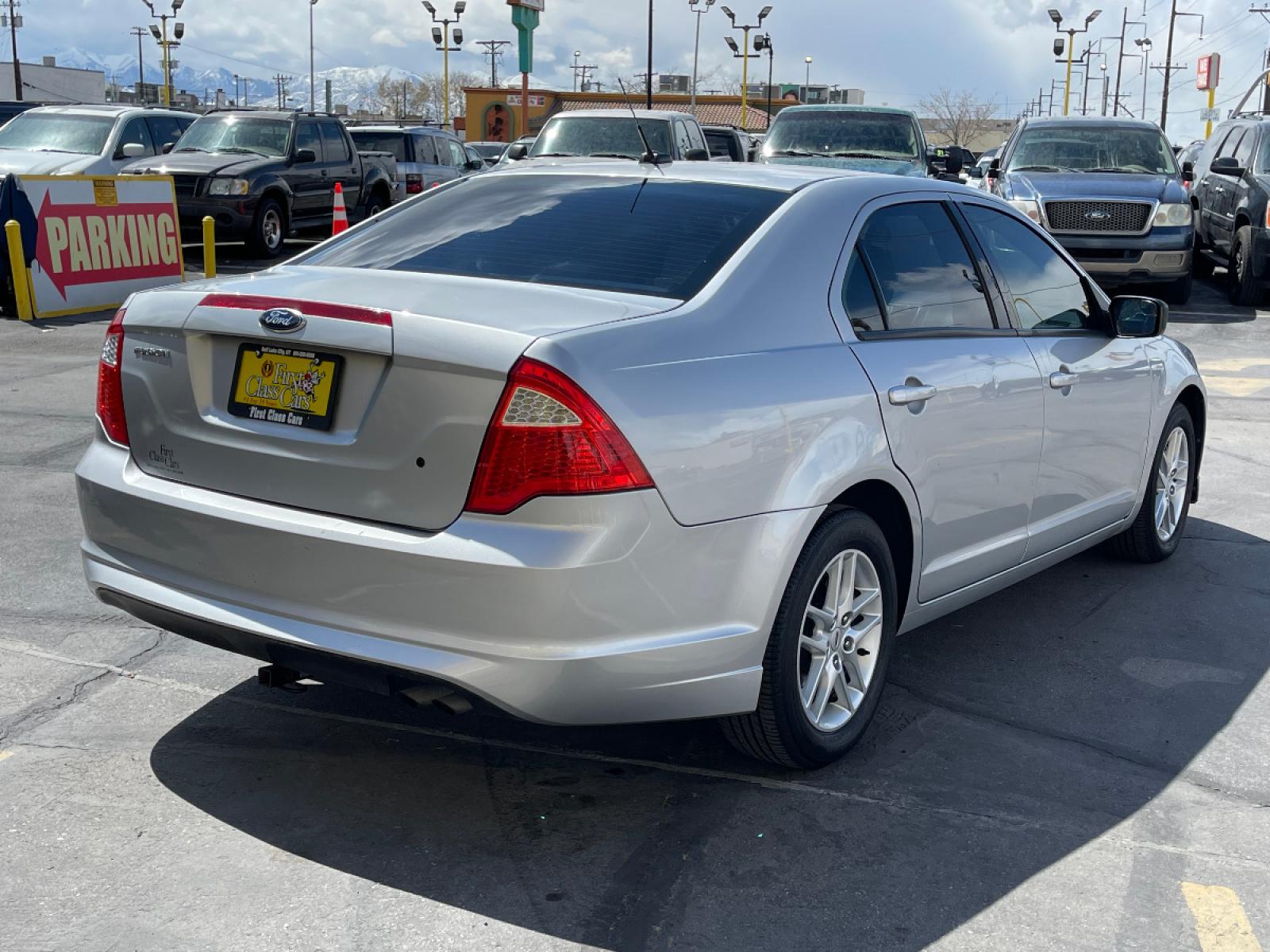 2012 Moondust Silver Metallic /Gray Cloth Ford Fusion S (3FAHP0GA1CR) with an 2.5L 4 Cyl. engine, Automatic transmission, located at 801 South State Street, Salt Lake City, UT, 84111, (801) 328-0098, 40.751953, -111.888206 - Life is crazy. Now is the time to buy! All of our prices are just dollars above our cost. These prices will change as soon as life isn't so crazy. So please call or come in. We are here to save you a lot of money! Our service department is OPEN DAILY to help with any of your service need - Photo #6
