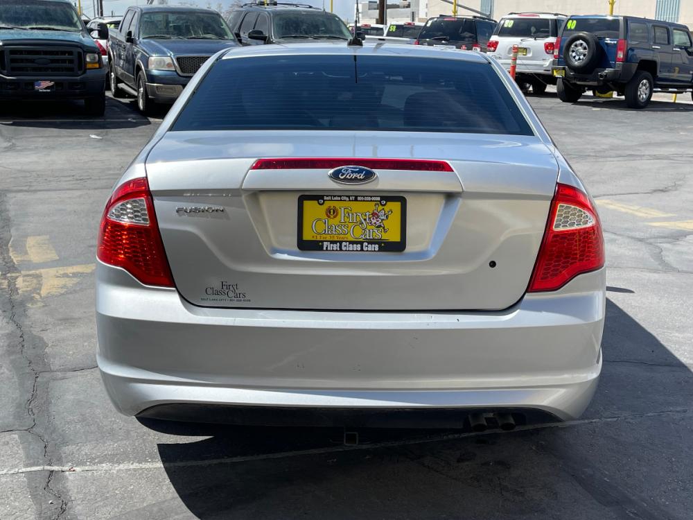 2012 Moondust Silver Metallic /Gray Cloth Ford Fusion S (3FAHP0GA1CR) with an 2.5L 4 Cyl. engine, Automatic transmission, located at 801 South State Street, Salt Lake City, UT, 84111, (801) 328-0098, 40.751953, -111.888206 - Photo #7