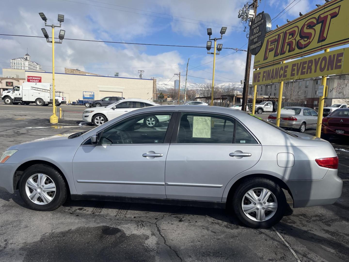 2005 Satin Silver Metallic /Gray Cloth Honda Accord LX (1HGCM56405A) with an 2.4L 4 Cyl. engine, Automatic transmission, located at 801 South State Street, Salt Lake City, UT, 84111, (801) 328-0098, 40.751953, -111.888206 - *MILEAGE DISCREPANCY ACCORDING TO CARFAX REPORT! TRUE MILES UNKNOWN!* Vehicle Features: LX Model, Automatic Transmission, ABS Brakes, Traction Control, Cruise Control, Air Conditioning, AM/FM Stereo, CD Player, Power Mirrors, Power Windows, Power Locks, Rear Defroster * All advertised prices are - Photo#8