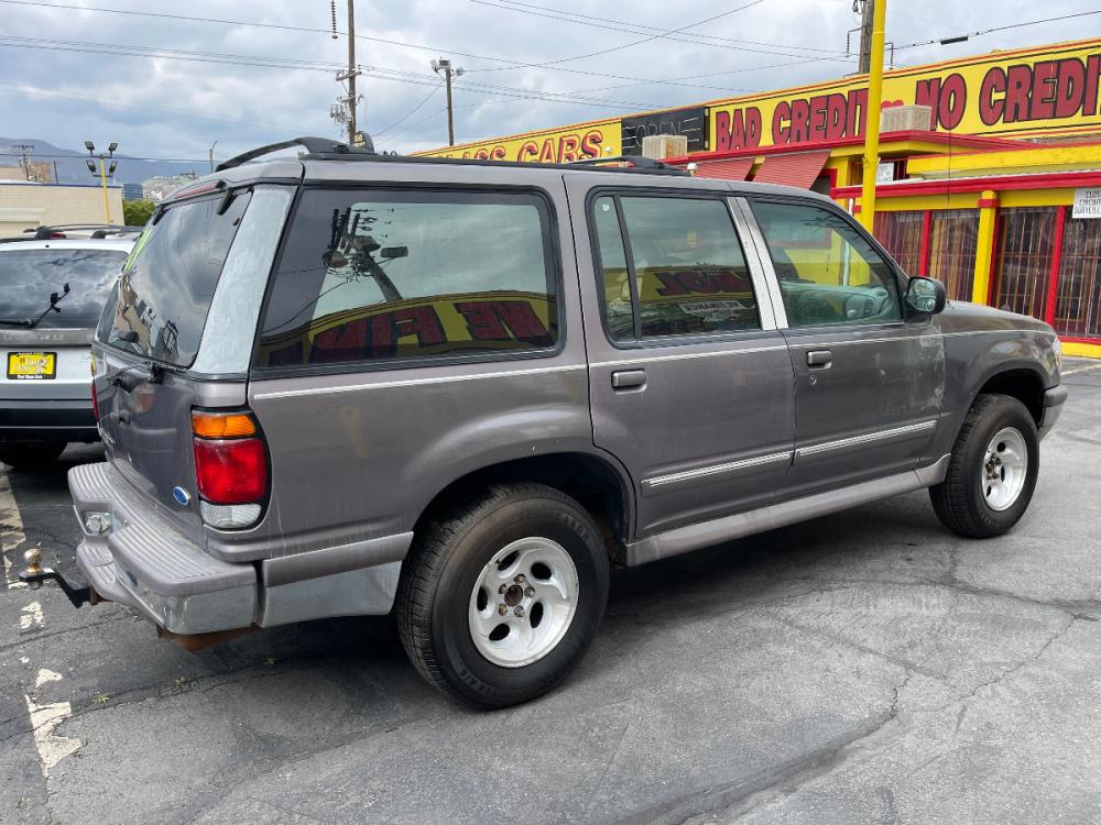 1997 Medium Graphite Metallic /Gray Cloth Ford Explorer XLT 4WD (1FMDU34X1VZ) with an 4.0L V6 engine, Automatic transmission, located at 801 South State Street, Salt Lake City, UT, 84111, (801) 328-0098, 40.751953, -111.888206 - ***REBUILT/RESTORED TITLE!!** *MECHANIC SPECIAL! AS-IS!* BACK-LOT SPECIAL! This car just came in on trade and is being sold AS-IS. It may have mechanical or other cosmetic problems. It is being offered for sale to the public at a bargain price prior to it being sold at auction. The car has NOT been - Photo #3