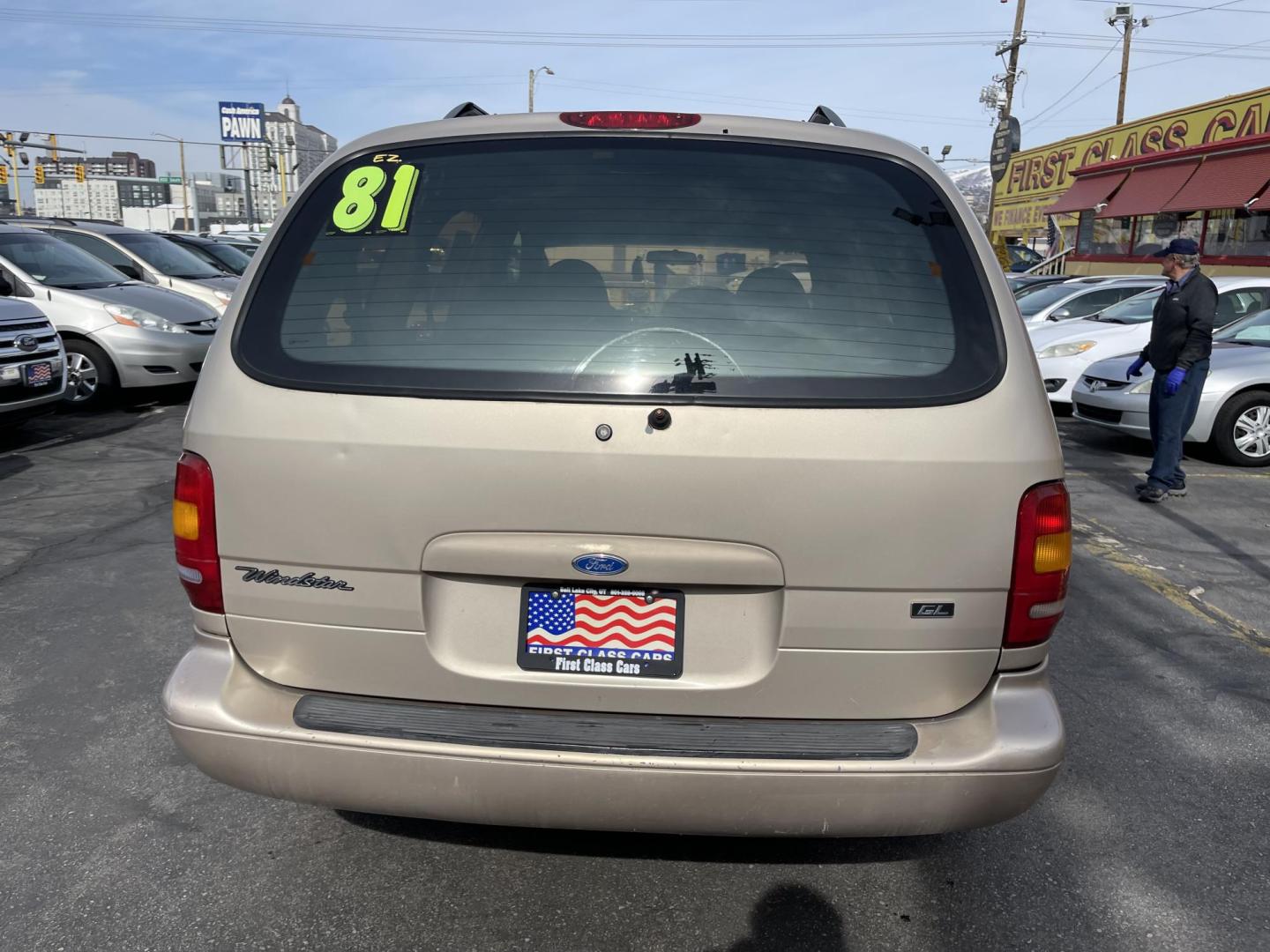 1998 Light Saddle Metallic /Tan Cloth Ford Windstar Base (2FMDA5141WB) with an 3.8L V6 engine, Automatic transmission, located at 801 South State Street, Salt Lake City, UT, 84111, (801) 328-0098, 40.751953, -111.888206 - 1998 Ford Windstar basic commuter van to get to and from work. Features: Automatic, power windows, power lock, hub caps, am/fm/cassett, 3.8 liter 6 cylinder, clean title history, passed emissions ready for licensing. * All advertised prices are just dollars above cost to make room for new invent - Photo#4