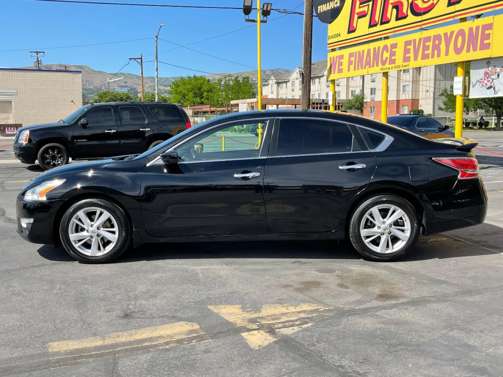 2015 Black Metallic /Black Cloth Nissan Altima 2.5 S (1N4AL3AP1FC) with an 2.5L 4 Cyl. engine, Automatic transmission, located at 801 South State Street, Salt Lake City, UT, 84111, (801) 328-0098, 40.751953, -111.888206 - Life is crazy. Now is the time to buy! All of our prices are just dollars above our cost. These prices will change as soon as life isn't so crazy. So please call or come in. We are here to save you a lot of money! Our service department is OPEN DAILY to help with any of your service need - Photo #1