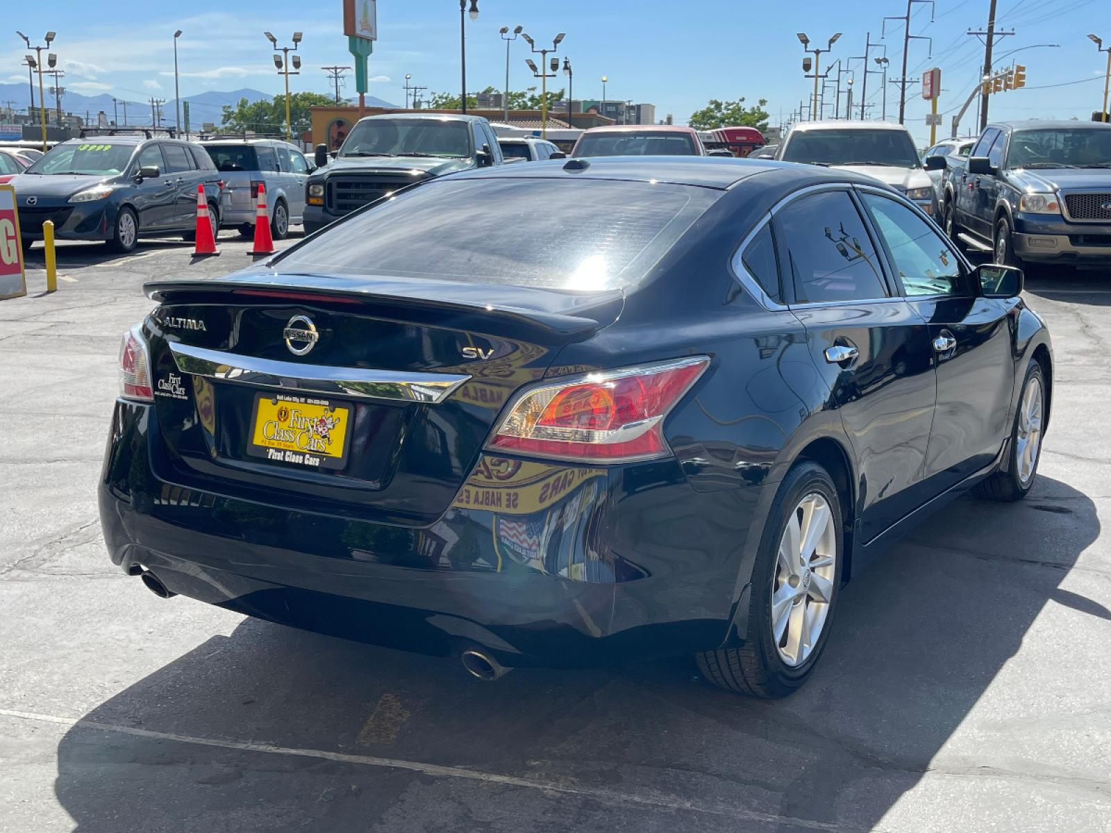 2015 Black Metallic /Black Cloth Nissan Altima 2.5 S (1N4AL3AP1FC) with an 2.5L 4 Cyl. engine, Automatic transmission, located at 801 South State Street, Salt Lake City, UT, 84111, (801) 328-0098, 40.751953, -111.888206 - Life is crazy. Now is the time to buy! All of our prices are just dollars above our cost. These prices will change as soon as life isn't so crazy. So please call or come in. We are here to save you a lot of money! Our service department is OPEN DAILY to help with any of your service need - Photo #6