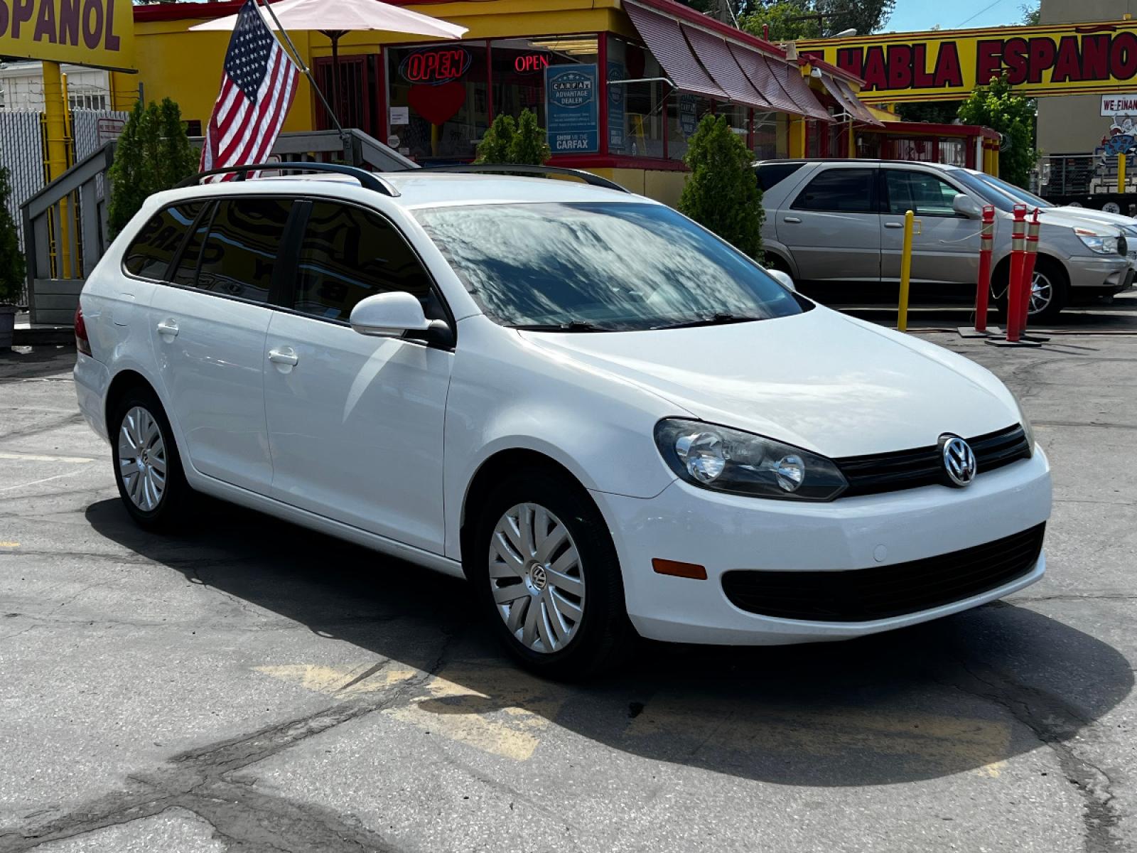 2011 Candy White Volkswagen Jetta SportWagen 2.5L SE (3VWPX7AJ1BM) with an 2.5L 5 Cyl. engine, Automatic transmission, located at 801 South State Street, Salt Lake City, UT, 84111, (801) 328-0098, 40.751953, -111.888206 - Life is crazy. Now is the time to buy! All of our prices are just dollars above our cost. These prices will change as soon as life isn't so crazy. So please call or come in. We are here to save you a lot of money! Our service department is OPEN DAILY to help with any of your service needs. P - Photo #4
