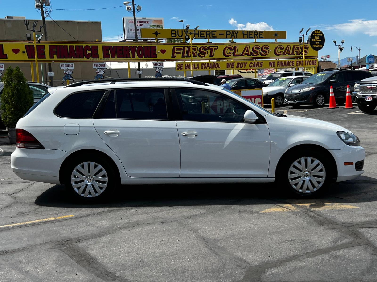 2011 Candy White Volkswagen Jetta SportWagen 2.5L SE (3VWPX7AJ1BM) with an 2.5L 5 Cyl. engine, Automatic transmission, located at 801 South State Street, Salt Lake City, UT, 84111, (801) 328-0098, 40.751953, -111.888206 - Life is crazy. Now is the time to buy! All of our prices are just dollars above our cost. These prices will change as soon as life isn't so crazy. So please call or come in. We are here to save you a lot of money! Our service department is OPEN DAILY to help with any of your service needs. P - Photo #5