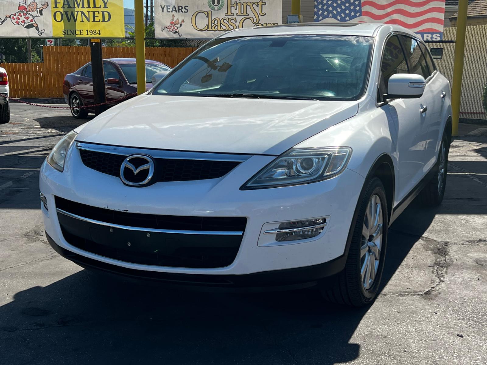 2009 Crystal White Pearl Mazda CX-9 Grand Touring FWD (JM3TB28A090) with an 3.7L V6 engine, Automatic transmission, located at 801 South State Street, Salt Lake City, UT, 84111, (801) 328-0098, 40.751953, -111.888206 - Life is crazy. Now is the time to buy! All of our prices are just dollars above our cost. These prices will change as soon as life isn't so crazy. So please call or come in. We are here to save you a lot of money! Our service department is OPEN DAILY to help with any of your service needs. P - Photo #2