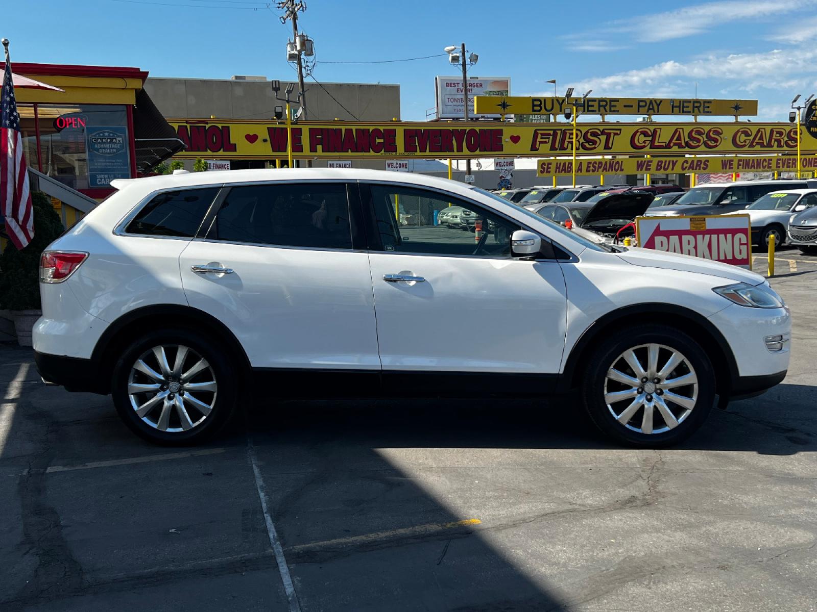 2009 Crystal White Pearl Mazda CX-9 Grand Touring FWD (JM3TB28A090) with an 3.7L V6 engine, Automatic transmission, located at 801 South State Street, Salt Lake City, UT, 84111, (801) 328-0098, 40.751953, -111.888206 - Life is crazy. Now is the time to buy! All of our prices are just dollars above our cost. These prices will change as soon as life isn't so crazy. So please call or come in. We are here to save you a lot of money! Our service department is OPEN DAILY to help with any of your service needs. P - Photo #5
