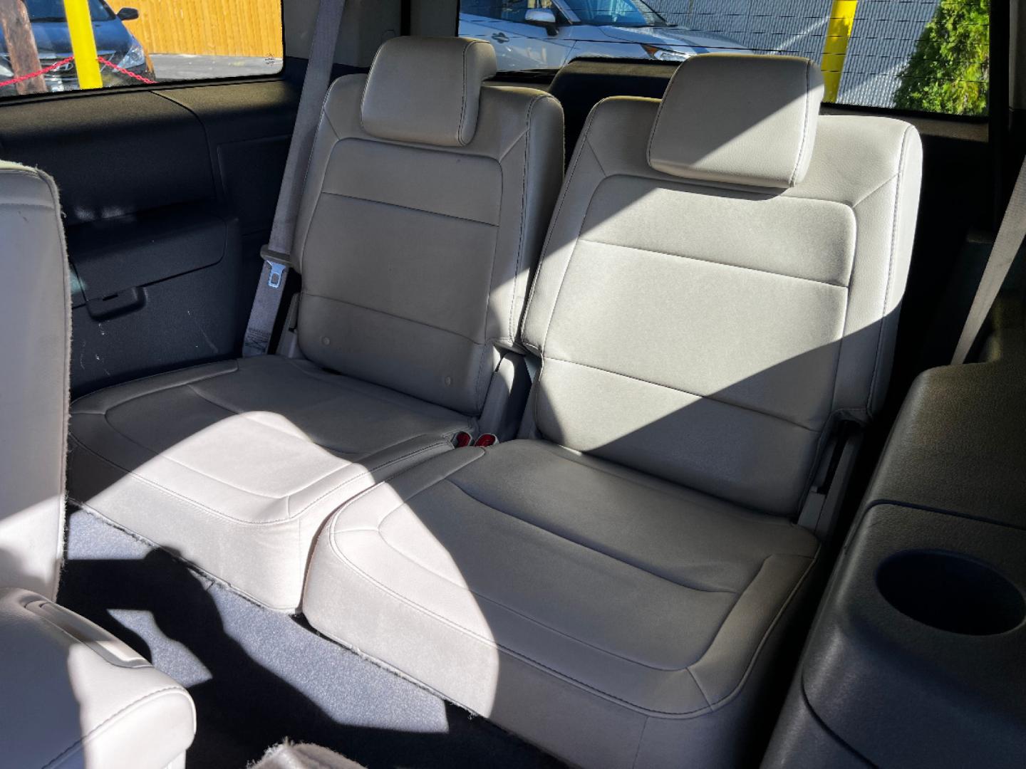 2009 Sterling Gray Metallic Ford Flex SEL (2FMDK52C49B) with an 3.5L V6 engine, Automatic transmission, located at 801 South State Street, Salt Lake City, UT, 84111, (801) 328-0098, 40.751953, -111.888206 - Super Clean nice car! 3rd row seating, leather fully loaded! Great family vehicle! Clean Title!! Extra clean!! Immaculate condition!! Free Carfax!! Must see!! Warranty available!! Free Carfax!!! Vehicle Features:ABS Brakes, Air Conditioning, Alloy Wheels, AM/FM Stereo, Automatic Transmission, A - Photo#27
