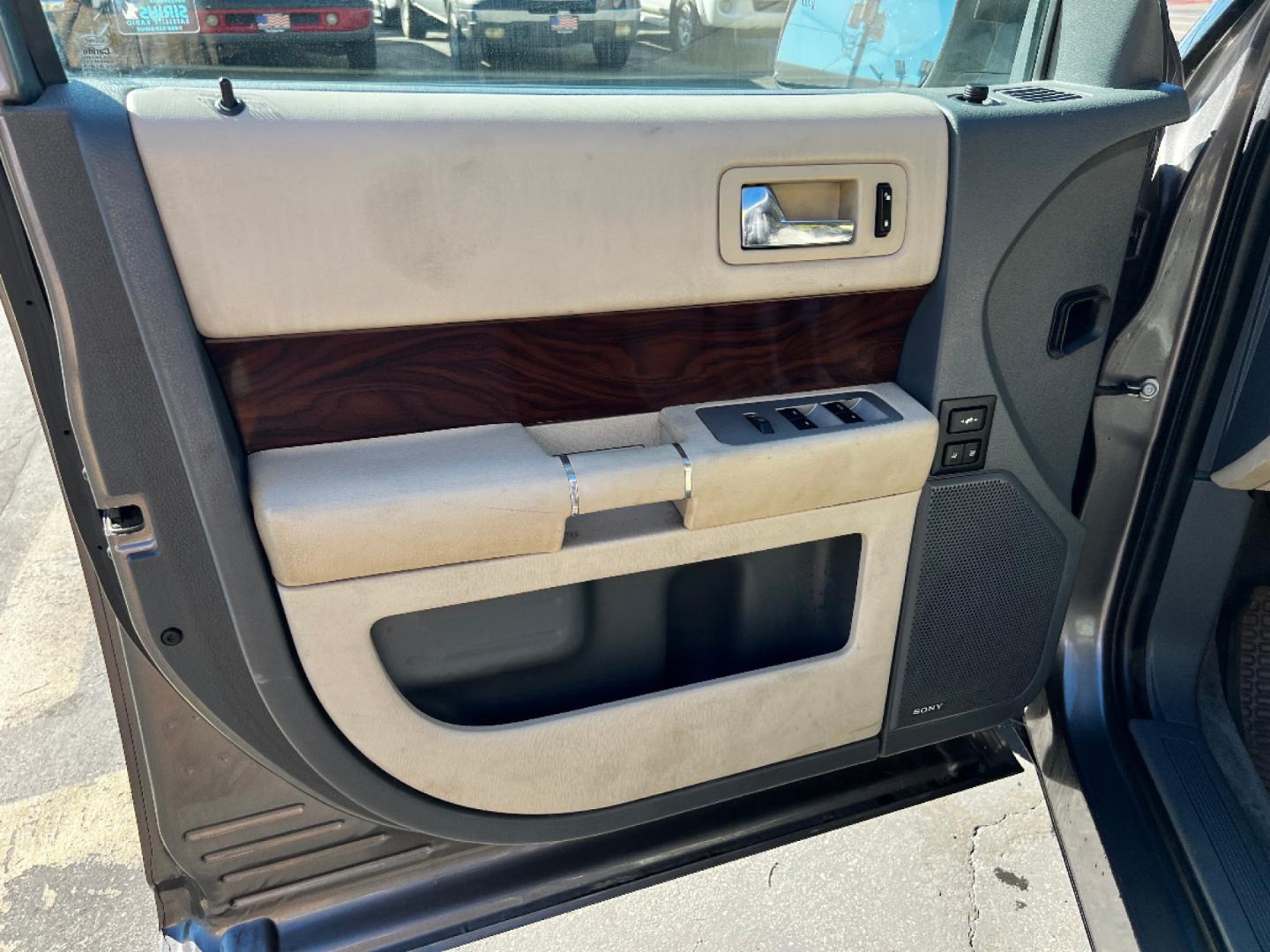 2009 Sterling Gray Metallic Ford Flex SEL (2FMDK52C49B) with an 3.5L V6 engine, Automatic transmission, located at 801 South State Street, Salt Lake City, UT, 84111, (801) 328-0098, 40.751953, -111.888206 - Super Clean nice car! 3rd row seating, leather fully loaded! Great family vehicle! Clean Title!! Extra clean!! Immaculate condition!! Free Carfax!! Must see!! Warranty available!! Free Carfax!!! Vehicle Features:ABS Brakes, Air Conditioning, Alloy Wheels, AM/FM Stereo, Automatic Transmission, A - Photo#13