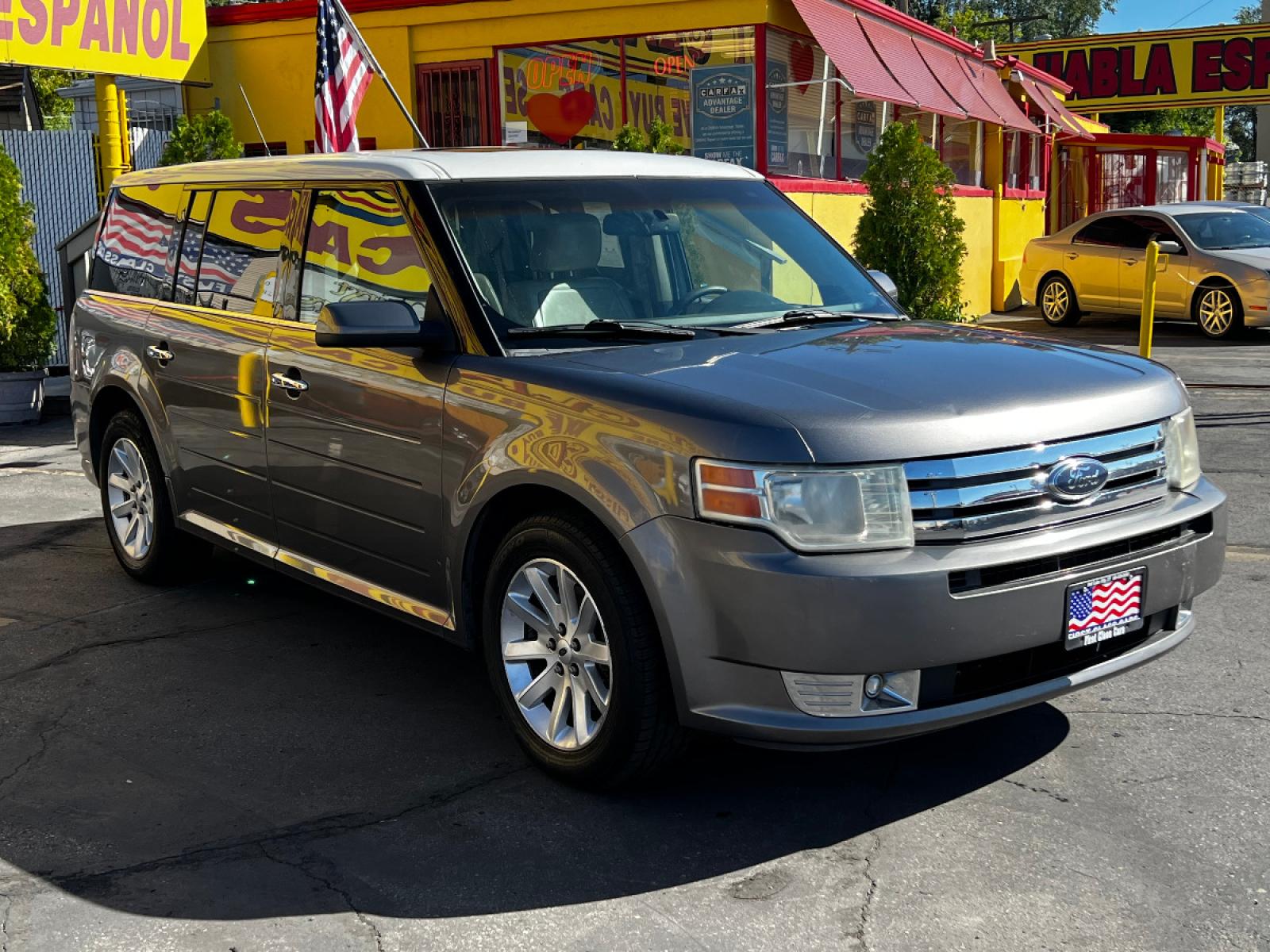 2009 Sterling Gray Metallic Ford Flex SEL (2FMDK52C49B) with an 3.5L V6 engine, Automatic transmission, located at 801 South State Street, Salt Lake City, UT, 84111, (801) 328-0098, 40.751953, -111.888206 - Life is crazy. Now is the time to buy! All of our prices are just dollars above our cost. These prices will change as soon as life isn't so crazy. So please call or come in. We are here to save you a lot of money! Our service department is OPEN DAILY to help with any of your service needs. P - Photo #4