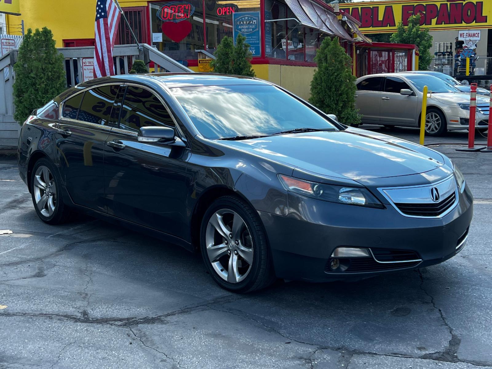 2012 Graphite Luster Metallic /Black Leather Acura TL SH-AWD (19UUA9F25CA) with an 3.5L V6 engine, Automatic transmission, located at 801 South State Street, Salt Lake City, UT, 84111, (801) 328-0098, 40.751953, -111.888206 - Life is crazy. Now is the time to buy! All of our prices are just dollars above our cost. These prices will change as soon as life isn't so crazy. So please call or come in. We are here to save you a lot of money! Our service department is OPEN DAILY to help with any of your service needs. P - Photo #4