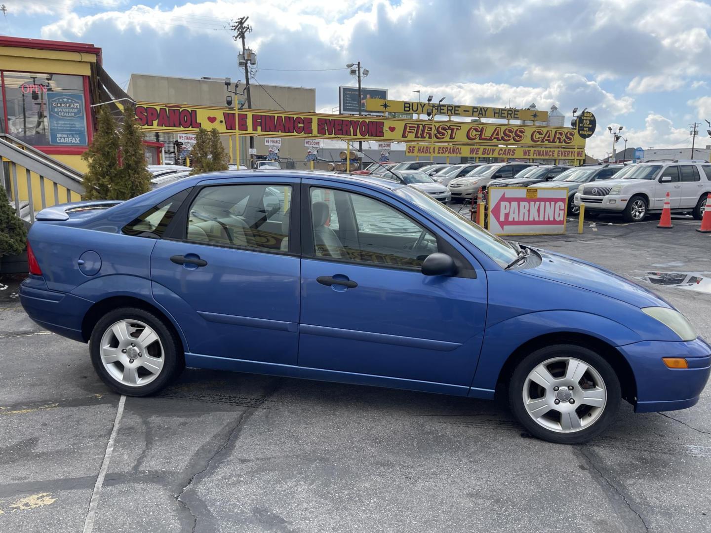 2004 French Blue Metallic /Gray Cloth Ford Focus ZTS (1FAFP38Z04W) with an 2.3L 4 Cyl. engine, Manual transmission, located at 801 South State Street, Salt Lake City, UT, 84111, (801) 328-0098, 40.751953, -111.888206 - Vehicle Features:ABS Brakes, Air Conditioning, Alloy Wheels, AM/FM Stereo, CD Audio, Cloth Seats, Cruise Control, Manual Transmission, Power Locks, Power Mirrors, Power Windows, Rear Defroster, Sunroof(s), Traction Control Our service department is OPEN DAILY to help with any of your service needs - Photo#4