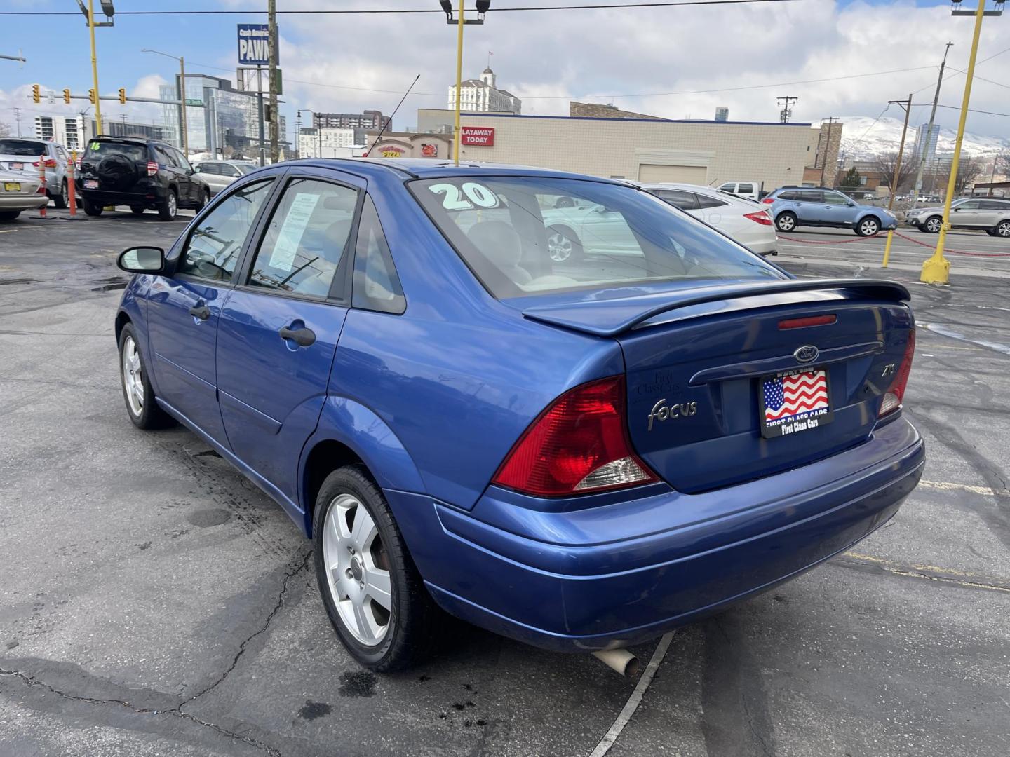 2004 French Blue Metallic /Gray Cloth Ford Focus ZTS (1FAFP38Z04W) with an 2.3L 4 Cyl. engine, Manual transmission, located at 801 South State Street, Salt Lake City, UT, 84111, (801) 328-0098, 40.751953, -111.888206 - Vehicle Features:ABS Brakes, Air Conditioning, Alloy Wheels, AM/FM Stereo, CD Audio, Cloth Seats, Cruise Control, Manual Transmission, Power Locks, Power Mirrors, Power Windows, Rear Defroster, Sunroof(s), Traction Control Our service department is OPEN DAILY to help with any of your service needs - Photo#7