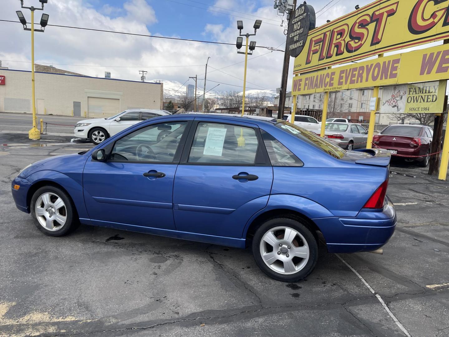 2004 French Blue Metallic /Gray Cloth Ford Focus ZTS (1FAFP38Z04W) with an 2.3L 4 Cyl. engine, Manual transmission, located at 801 South State Street, Salt Lake City, UT, 84111, (801) 328-0098, 40.751953, -111.888206 - Vehicle Features:ABS Brakes, Air Conditioning, Alloy Wheels, AM/FM Stereo, CD Audio, Cloth Seats, Cruise Control, Manual Transmission, Power Locks, Power Mirrors, Power Windows, Rear Defroster, Sunroof(s), Traction Control Our service department is OPEN DAILY to help with any of your service needs - Photo#8