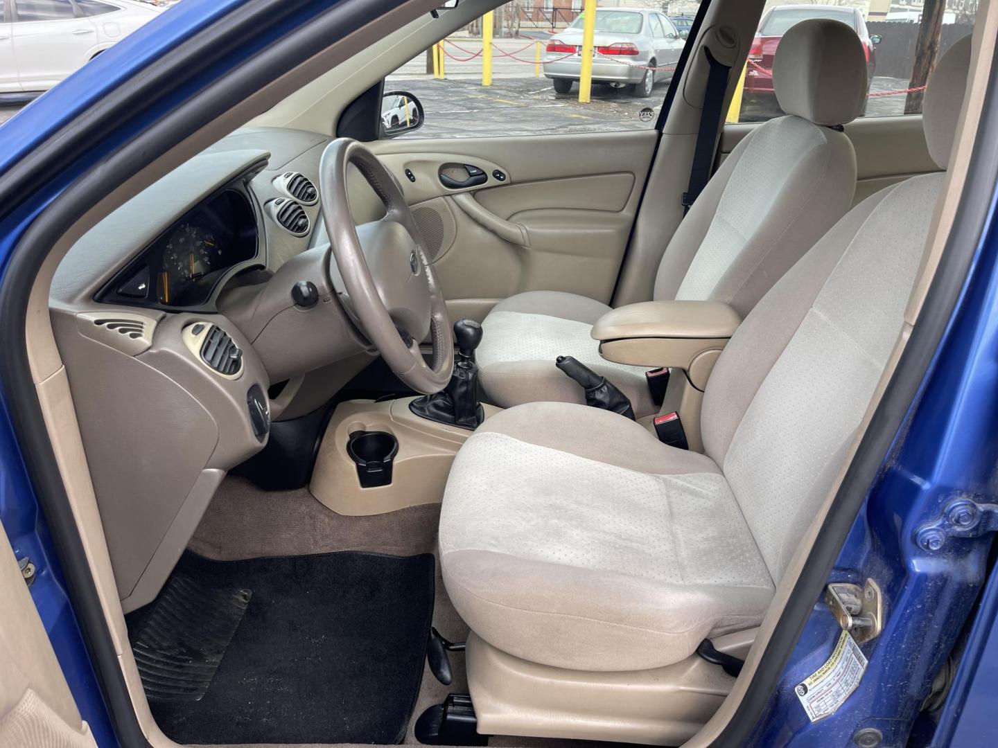 2004 French Blue Metallic /Gray Cloth Ford Focus ZTS (1FAFP38Z04W) with an 2.3L 4 Cyl. engine, Manual transmission, located at 801 South State Street, Salt Lake City, UT, 84111, (801) 328-0098, 40.751953, -111.888206 - Vehicle Features:ABS Brakes, Air Conditioning, Alloy Wheels, AM/FM Stereo, CD Audio, Cloth Seats, Cruise Control, Manual Transmission, Power Locks, Power Mirrors, Power Windows, Rear Defroster, Sunroof(s), Traction Control Our service department is OPEN DAILY to help with any of your service needs - Photo#9