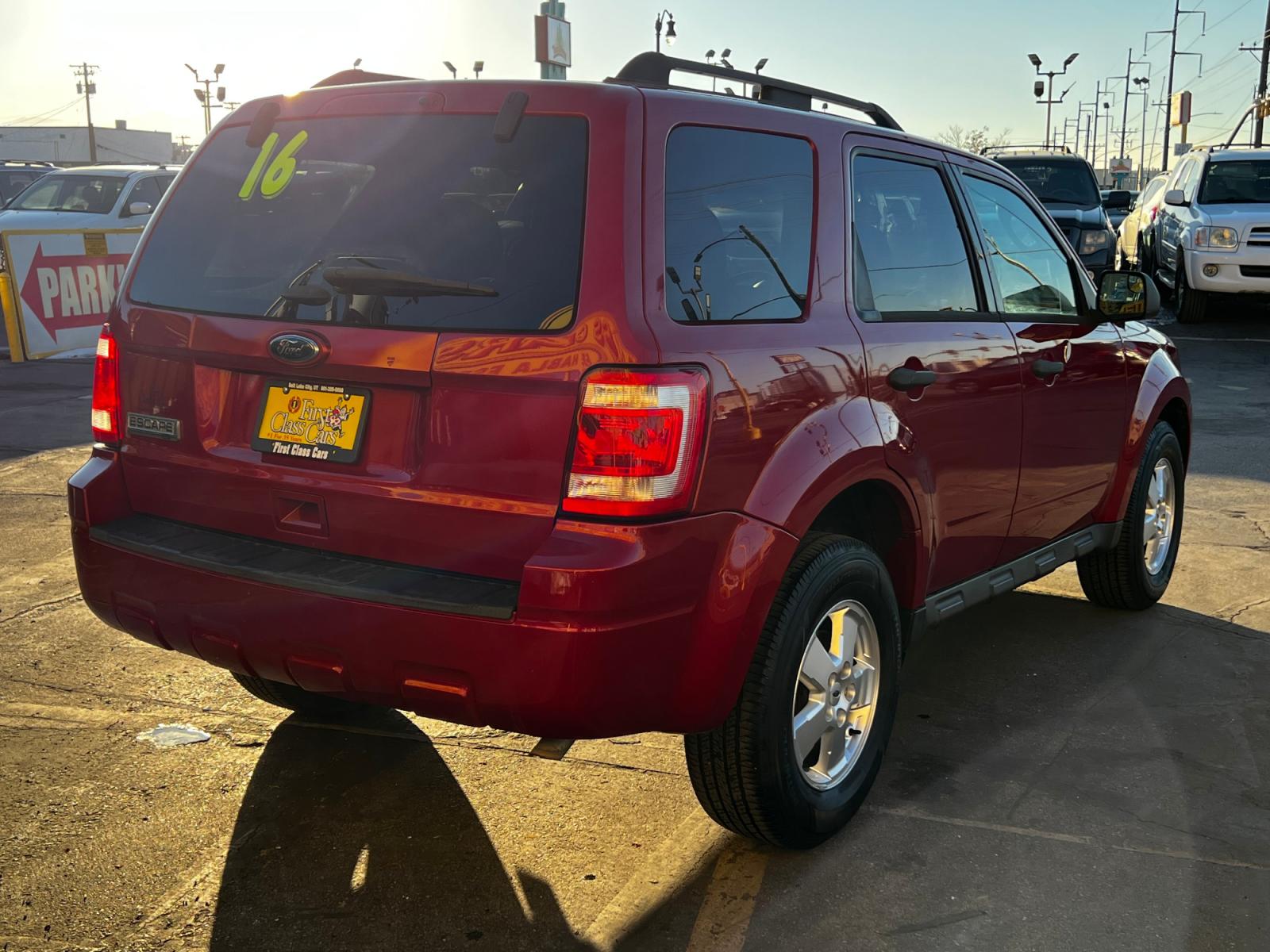 2011 Toreador Red Metallic /Gray Cloth Ford Escape XLT (1FMCU0D75BK) with an 2.5L 4 Cyl. engine, Automatic transmission, located at 801 South State Street, Salt Lake City, UT, 84111, (801) 328-0098, 40.751953, -111.888206 - Life is crazy. Now is the time to buy! All of our prices are just dollars above our cost. These prices will change as soon as life isn't so crazy. So please call or come in. We are here to save you a lot of money! Our service department is OPEN DAILY to help with any of your service needs. P - Photo #6