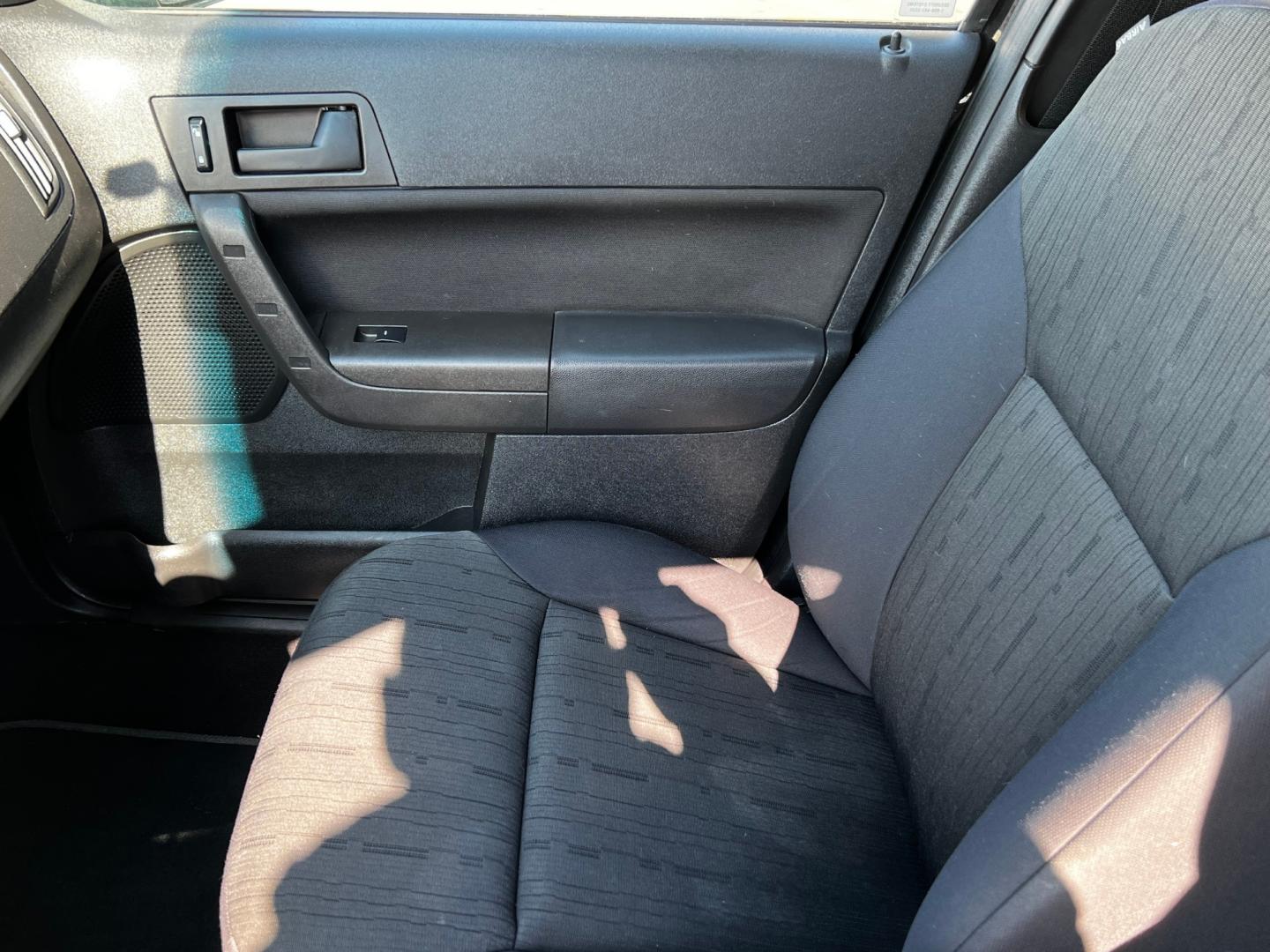 2011 Panther Black Metallic /Gray Cloth Ford Focus SE Sedan (1FAHP3FN8BW) with an 2.0L 4 Cyl. engine, Automatic transmission, located at 801 South State Street, Salt Lake City, UT, 84111, (801) 328-0098, 40.751953, -111.888206 - Life is crazy. Now is the time to buy! All of our prices are just dollars above our cost. These prices will change as soon as life isn't so crazy. So please call or come in. We are here to save you a lot of money! Our service department is OPEN DAILY to help with any of your service needs. Ple - Photo#15