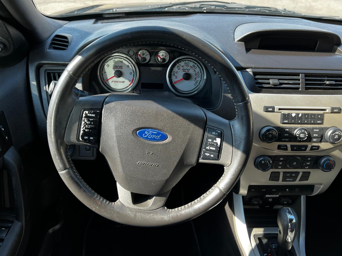 2011 Panther Black Metallic /Gray Cloth Ford Focus SE Sedan (1FAHP3FN8BW) with an 2.0L 4 Cyl. engine, Automatic transmission, located at 801 South State Street, Salt Lake City, UT, 84111, (801) 328-0098, 40.751953, -111.888206 - Life is crazy. Now is the time to buy! All of our prices are just dollars above our cost. These prices will change as soon as life isn't so crazy. So please call or come in. We are here to save you a lot of money! Our service department is OPEN DAILY to help with any of your service needs. Ple - Photo#16