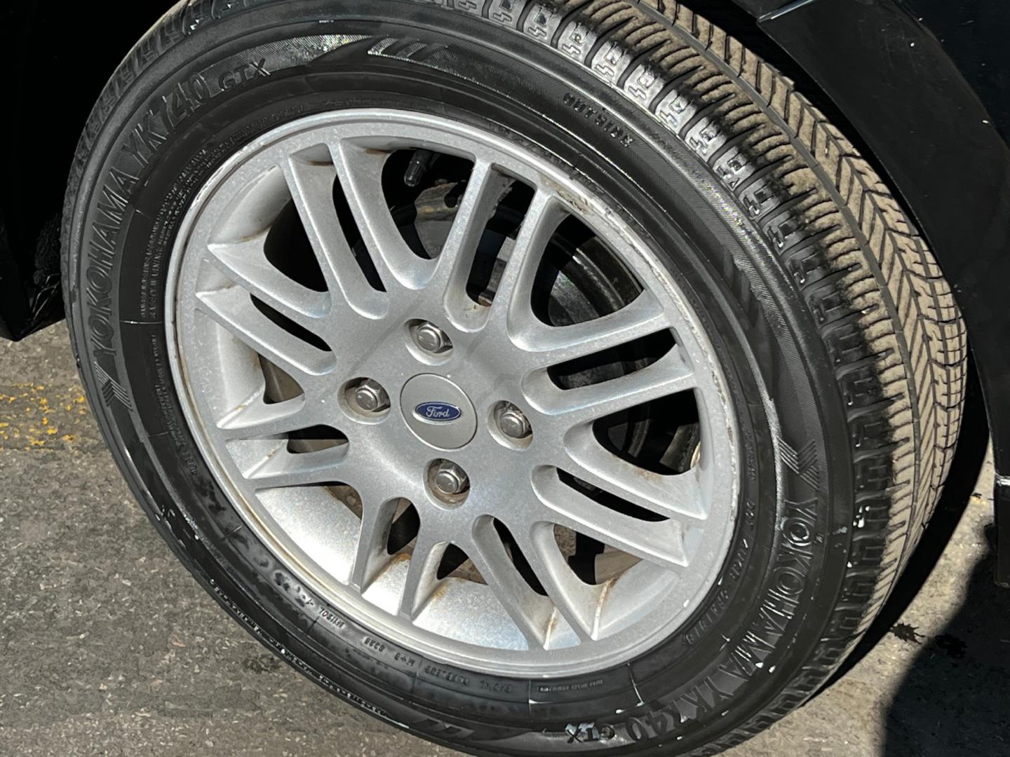 2011 Panther Black Metallic /Gray Cloth Ford Focus SE Sedan (1FAHP3FN8BW) with an 2.0L 4 Cyl. engine, Automatic transmission, located at 801 South State Street, Salt Lake City, UT, 84111, (801) 328-0098, 40.751953, -111.888206 - Life is crazy. Now is the time to buy! All of our prices are just dollars above our cost. These prices will change as soon as life isn't so crazy. So please call or come in. We are here to save you a lot of money! Our service department is OPEN DAILY to help with any of your service needs. Ple - Photo#10