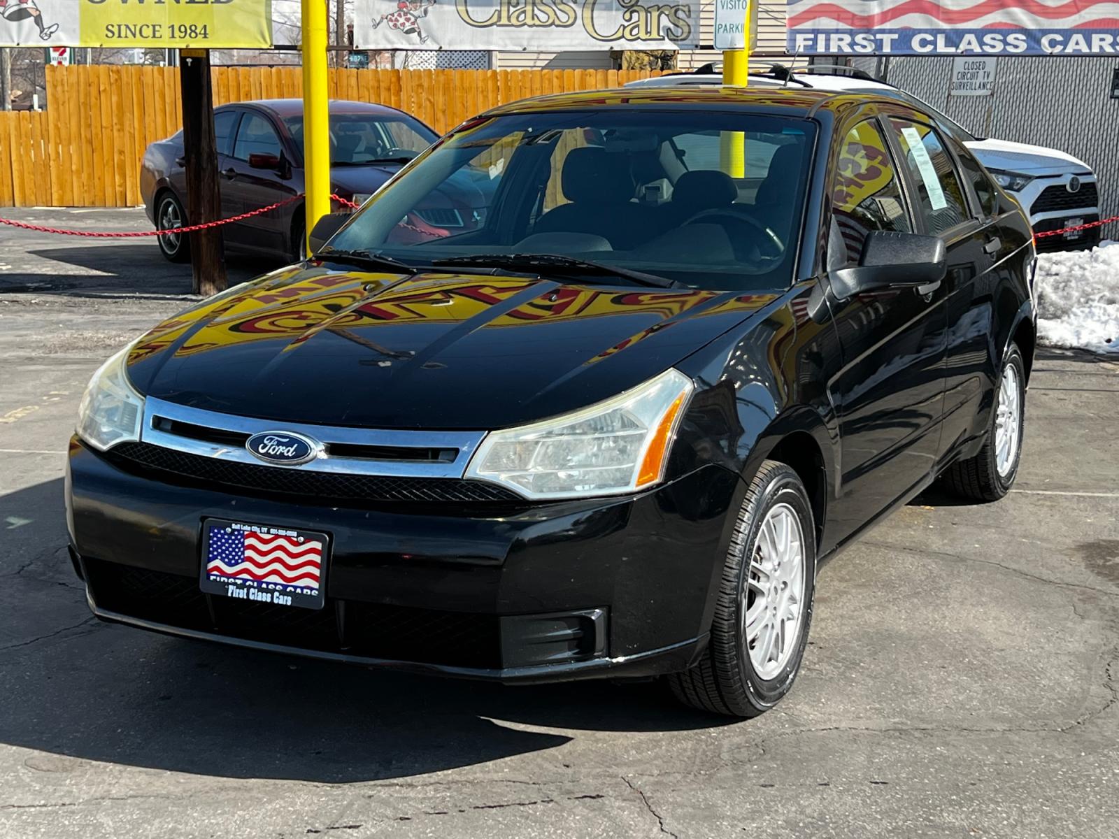 2011 Panther Black Metallic /Gray Cloth Ford Focus SE Sedan (1FAHP3FN8BW) with an 2.0L 4 Cyl. engine, Automatic transmission, located at 801 South State Street, Salt Lake City, UT, 84111, (801) 328-0098, 40.751953, -111.888206 - Life is crazy. Now is the time to buy! All of our prices are just dollars above our cost. These prices will change as soon as life isn't so crazy. So please call or come in. We are here to save you a lot of money! Our service department is OPEN DAILY to help with any of your service needs. P - Photo #2