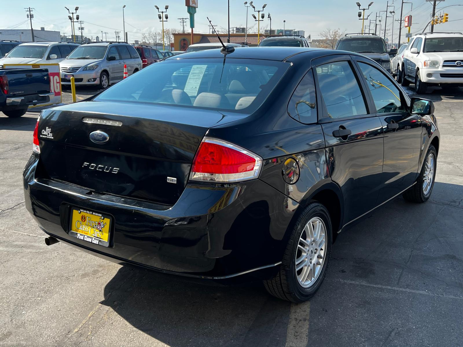 2011 Panther Black Metallic /Gray Cloth Ford Focus SE Sedan (1FAHP3FN8BW) with an 2.0L 4 Cyl. engine, Automatic transmission, located at 801 South State Street, Salt Lake City, UT, 84111, (801) 328-0098, 40.751953, -111.888206 - Life is crazy. Now is the time to buy! All of our prices are just dollars above our cost. These prices will change as soon as life isn't so crazy. So please call or come in. We are here to save you a lot of money! Our service department is OPEN DAILY to help with any of your service needs. P - Photo #6