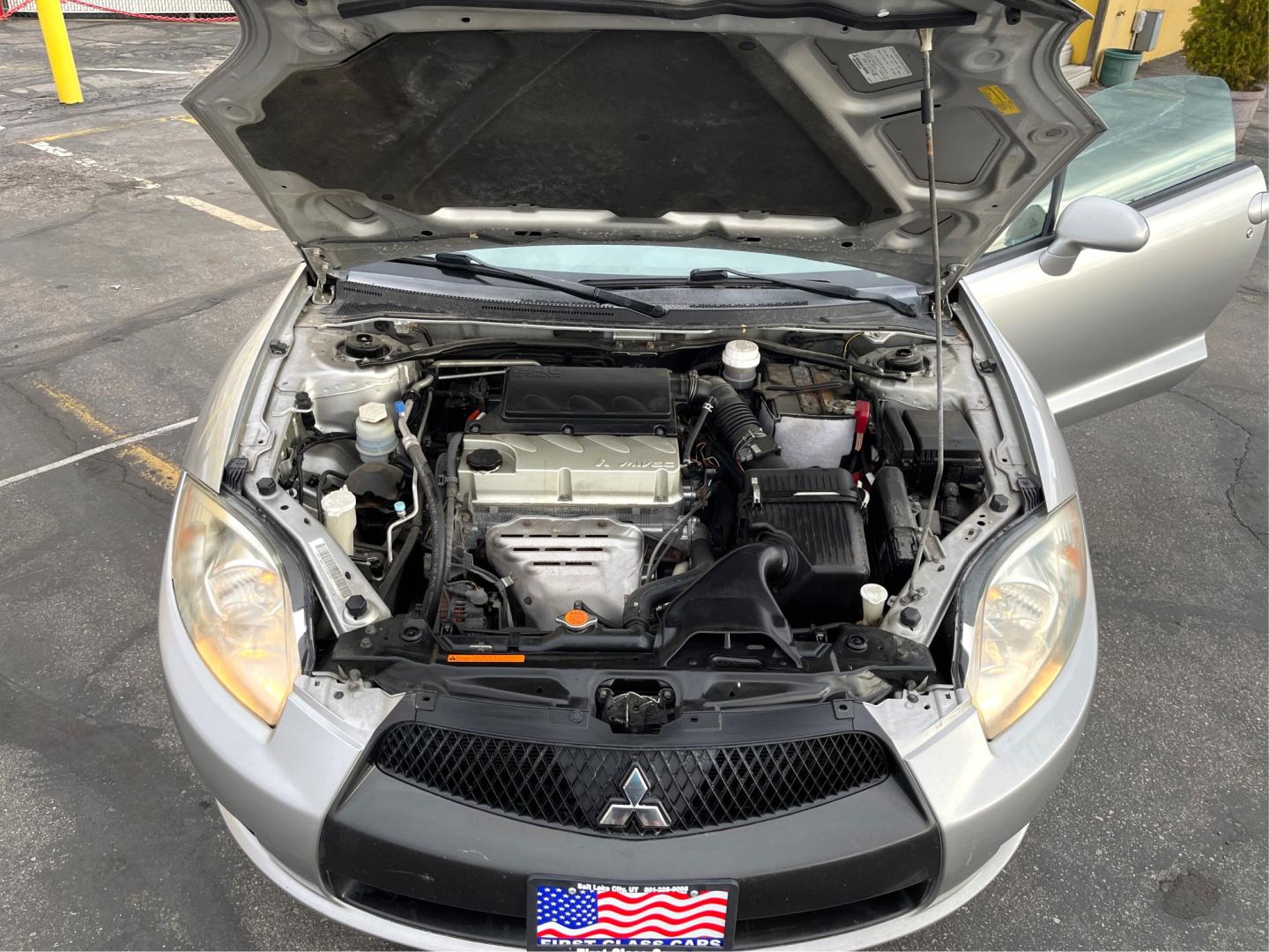 2012 Quick Silver Pearl /Gray Cloth Mitsubishi Eclipse GS Sport (4A31K5DF5CE) with an 2.4L 4 Cyl. engine, Automatic transmission, located at 801 South State Street, Salt Lake City, UT, 84111, (801) 328-0098, 40.751953, -111.888206 - Life is crazy. Now is the time to buy! All of our prices are just dollars above our cost. These prices will change as soon as life isn't so crazy. So please call or come in. We are here to save you a lot of money! Our service department is OPEN DAILY to help with any of your service needs. Please ca - Photo#10
