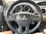 2012 Quick Silver Pearl /Gray Cloth Mitsubishi Eclipse GS Sport (4A31K5DF5CE) with an 2.4L 4 Cyl. engine, Automatic transmission, located at 801 South State Street, Salt Lake City, UT, 84111, (801) 328-0098, 40.751953, -111.888206 - Life is crazy. Now is the time to buy! All of our prices are just dollars above our cost. These prices will change as soon as life isn't so crazy. So please call or come in. We are here to save you a lot of money! Our service department is OPEN DAILY to help with any of your service needs. Please ca - Photo#16