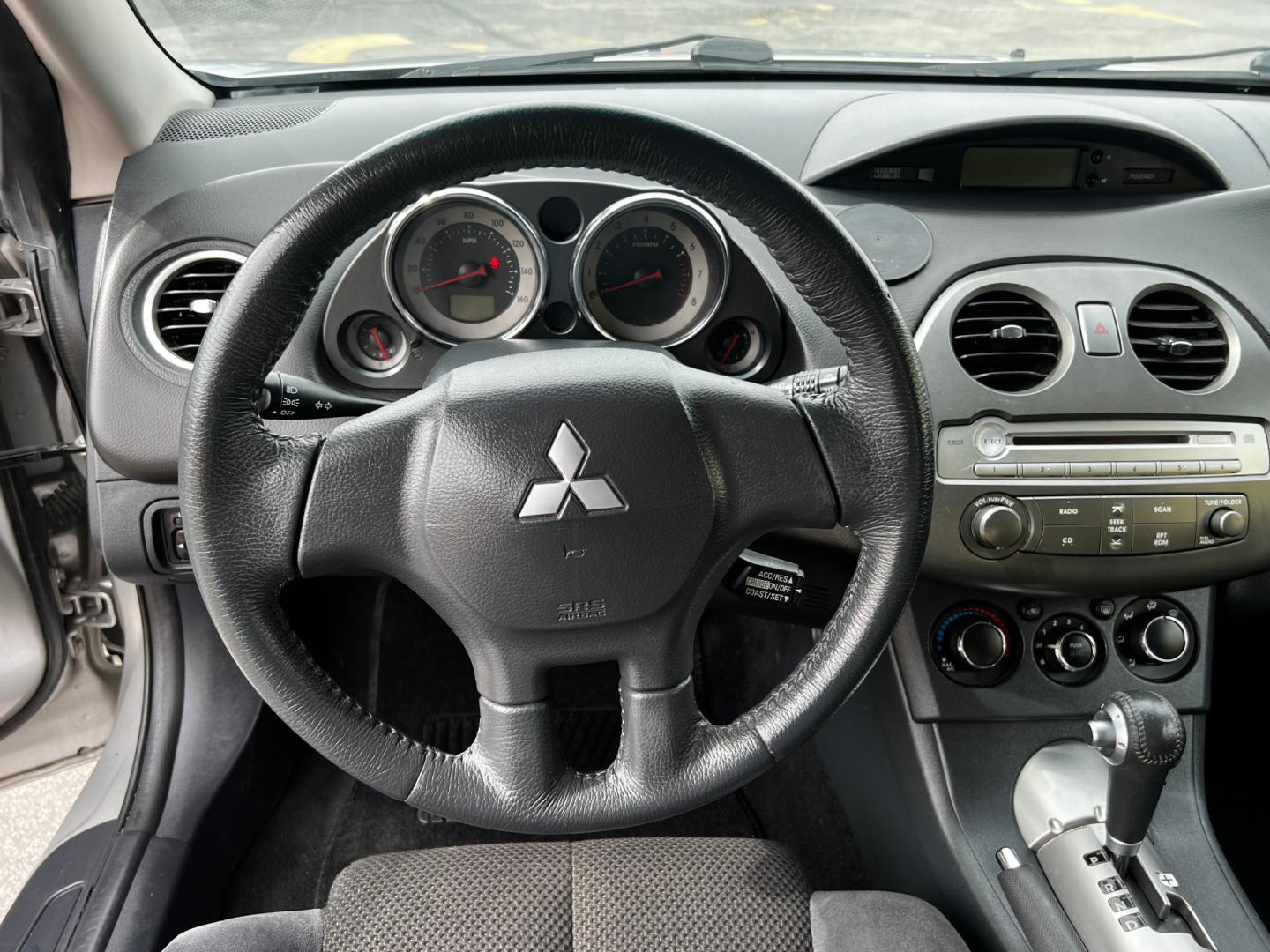 2012 Quick Silver Pearl /Gray Cloth Mitsubishi Eclipse GS Sport (4A31K5DF5CE) with an 2.4L 4 Cyl. engine, Automatic transmission, located at 801 South State Street, Salt Lake City, UT, 84111, (801) 328-0098, 40.751953, -111.888206 - Life is crazy. Now is the time to buy! All of our prices are just dollars above our cost. These prices will change as soon as life isn't so crazy. So please call or come in. We are here to save you a lot of money! Our service department is OPEN DAILY to help with any of your service needs. Please ca - Photo#28