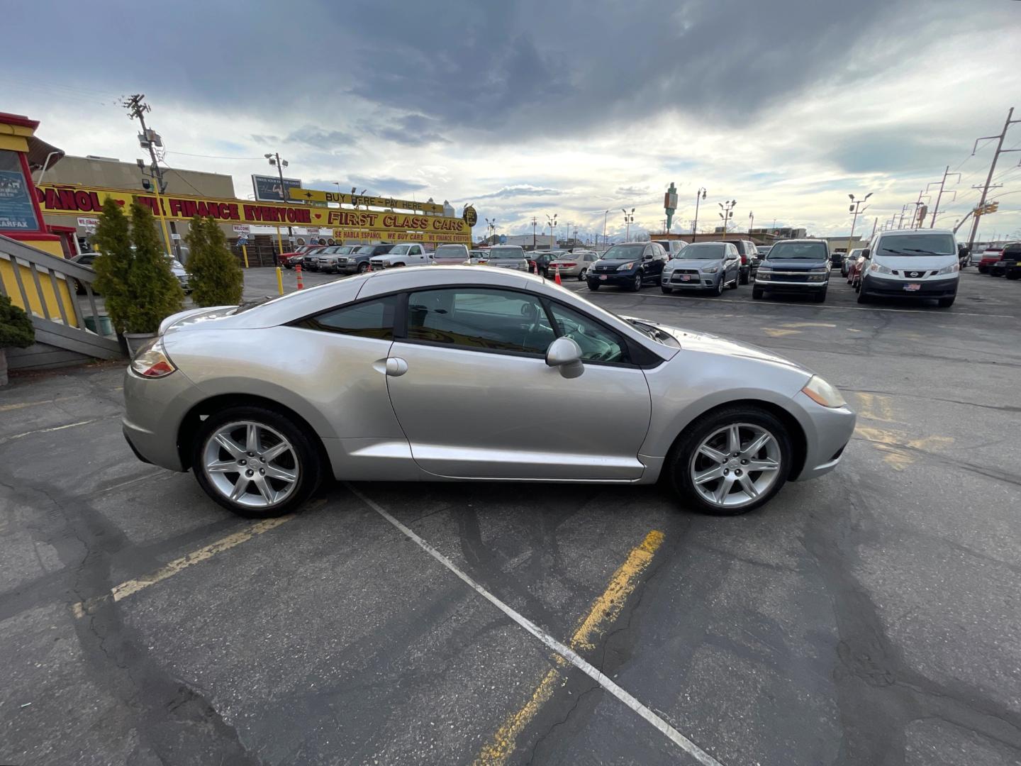2012 Quick Silver Pearl /Gray Cloth Mitsubishi Eclipse GS Sport (4A31K5DF5CE) with an 2.4L 4 Cyl. engine, Automatic transmission, located at 801 South State Street, Salt Lake City, UT, 84111, (801) 328-0098, 40.751953, -111.888206 - Life is crazy. Now is the time to buy! All of our prices are just dollars above our cost. These prices will change as soon as life isn't so crazy. So please call or come in. We are here to save you a lot of money! Our service department is OPEN DAILY to help with any of your service needs. Please ca - Photo#2