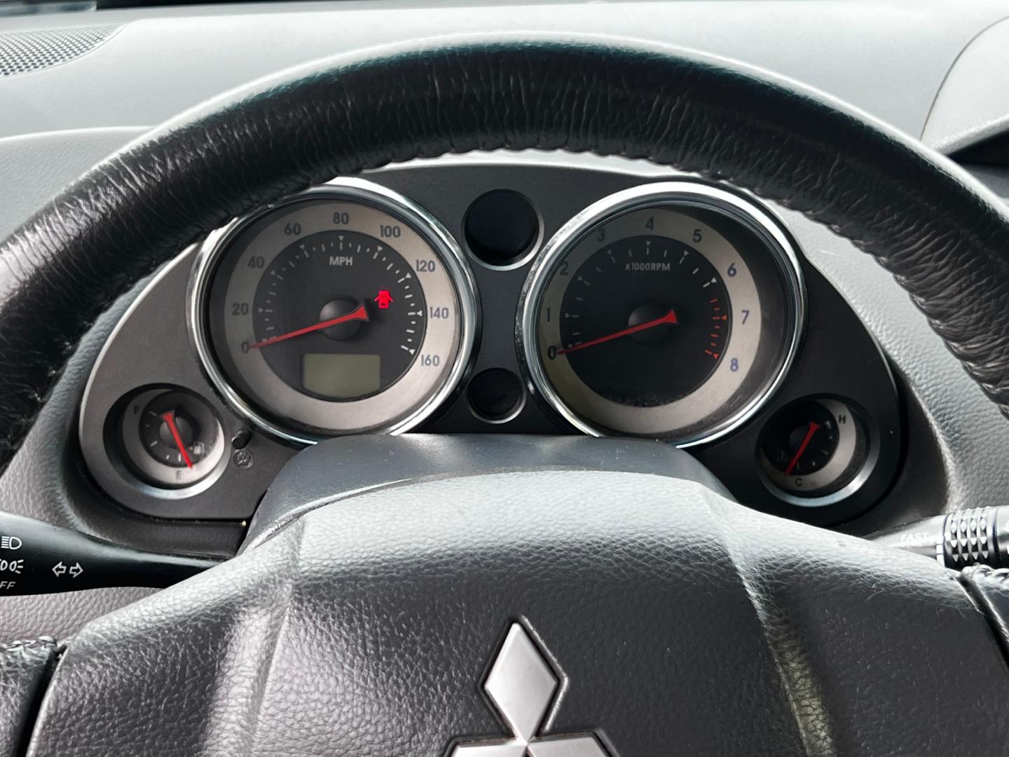 2012 Quick Silver Pearl /Gray Cloth Mitsubishi Eclipse GS Sport (4A31K5DF5CE) with an 2.4L 4 Cyl. engine, Automatic transmission, located at 801 South State Street, Salt Lake City, UT, 84111, (801) 328-0098, 40.751953, -111.888206 - Life is crazy. Now is the time to buy! All of our prices are just dollars above our cost. These prices will change as soon as life isn't so crazy. So please call or come in. We are here to save you a lot of money! Our service department is OPEN DAILY to help with any of your service needs. Please ca - Photo#29