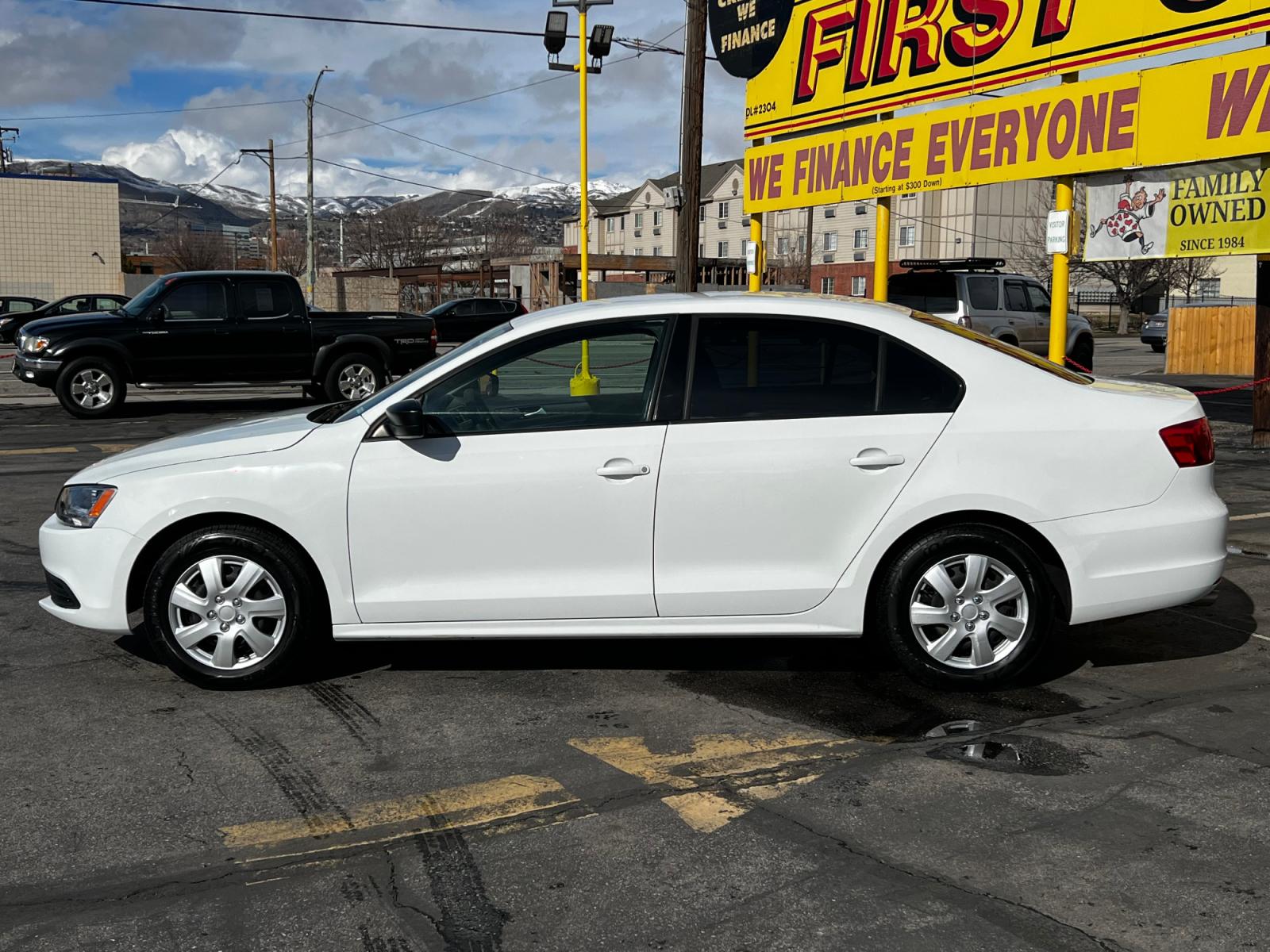 2014 Pure White /Gray Cloth Volkswagen Jetta S (3VW2K7AJ6EM) with an 2.0L 4 Cyl. engine, Automatic transmission, located at 801 South State Street, Salt Lake City, UT, 84111, (801) 328-0098, 40.751953, -111.888206 - Life is crazy. Now is the time to buy! All of our prices are just dollars above our cost. These prices will change as soon as life isn't so crazy. So please call or come in. We are here to save you a lot of money! Our service department is OPEN DAILY to help with any of your service needs. P - Photo #1